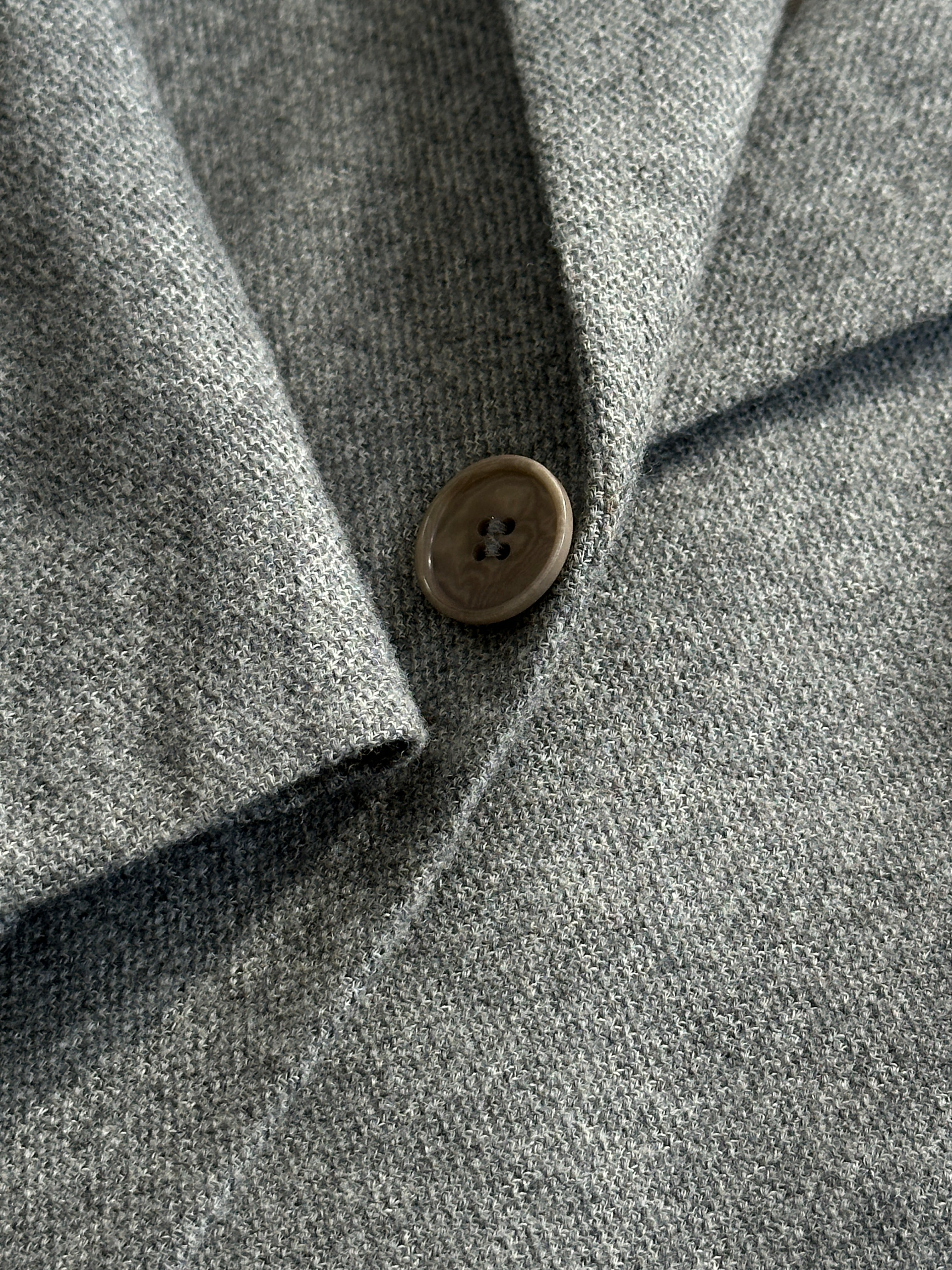 Vintage brushed wool single-breasted blazer for men, tailored fit with notch lapel and classic design, in a neutral color.