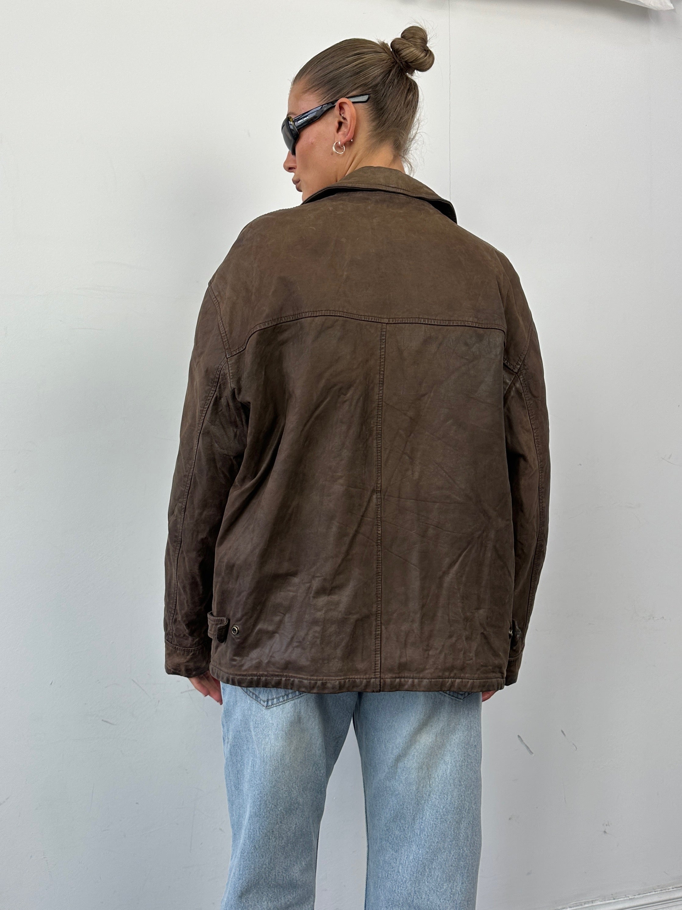Vintage Italian vintage nubuck leather zip-up jacket, size large, featuring a classic design and soft textured leather.