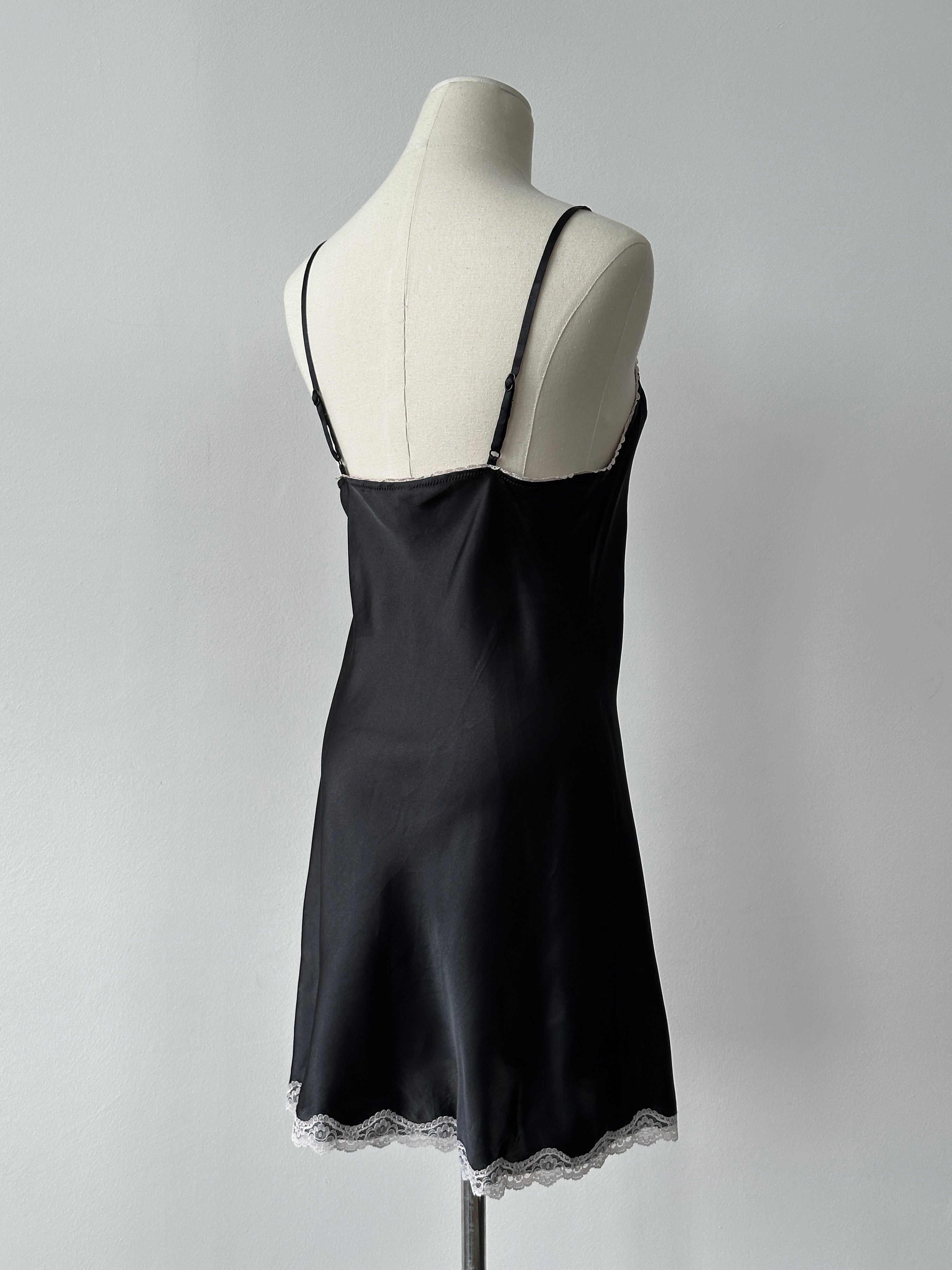 Vintage 1990s satin lace mini slip dress in cream with delicate lace trim, size small to medium, classic retro style.