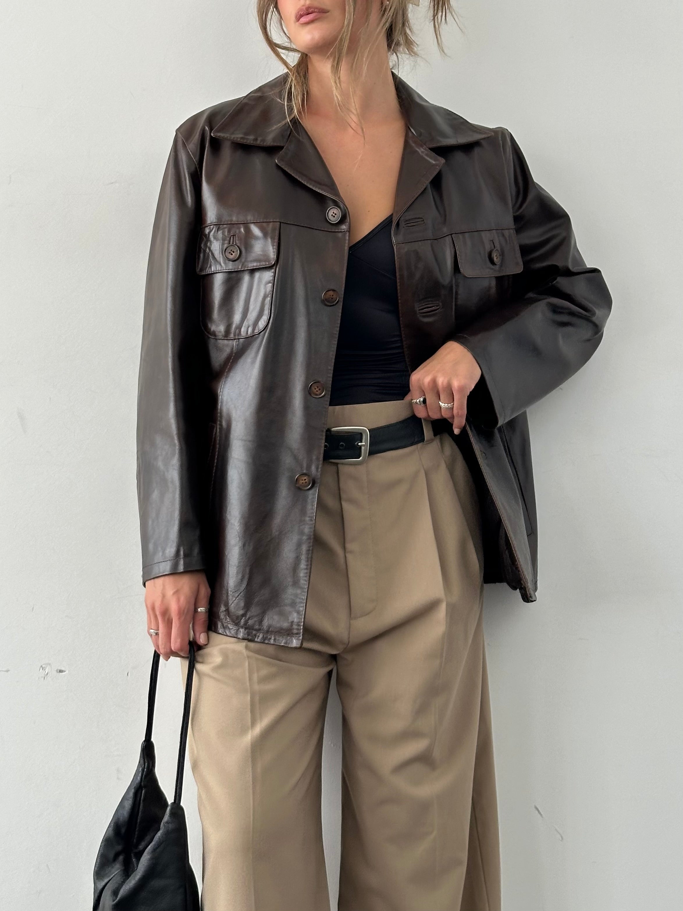 Conbipel boxy leather jacket in size L, featuring a stylish cropped design and classic black leather exterior.