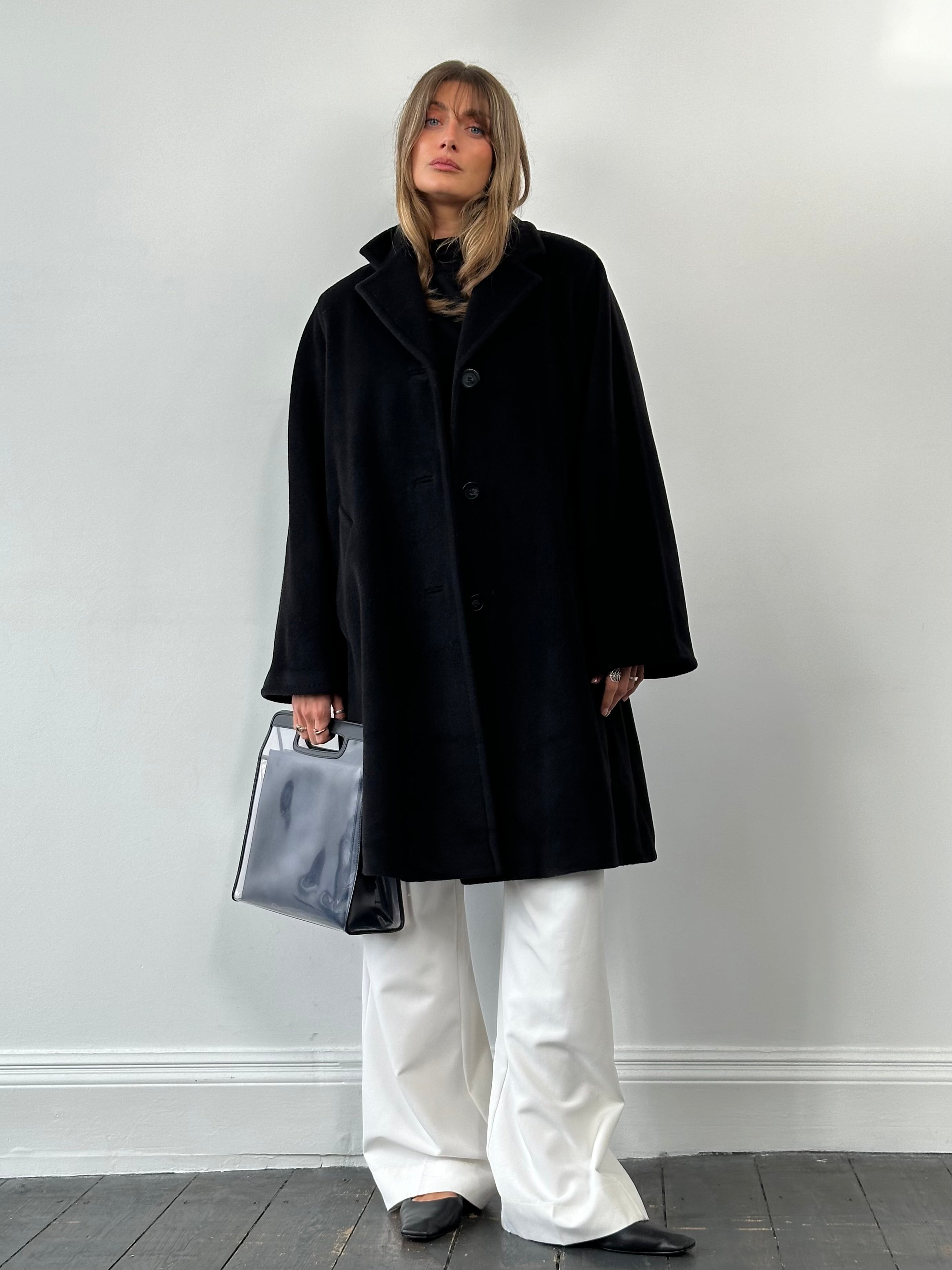 Max Mara wool and cashmere A-line coat in XL/XXL, featuring a classic silhouette and neutral color, displayed on a hanger.