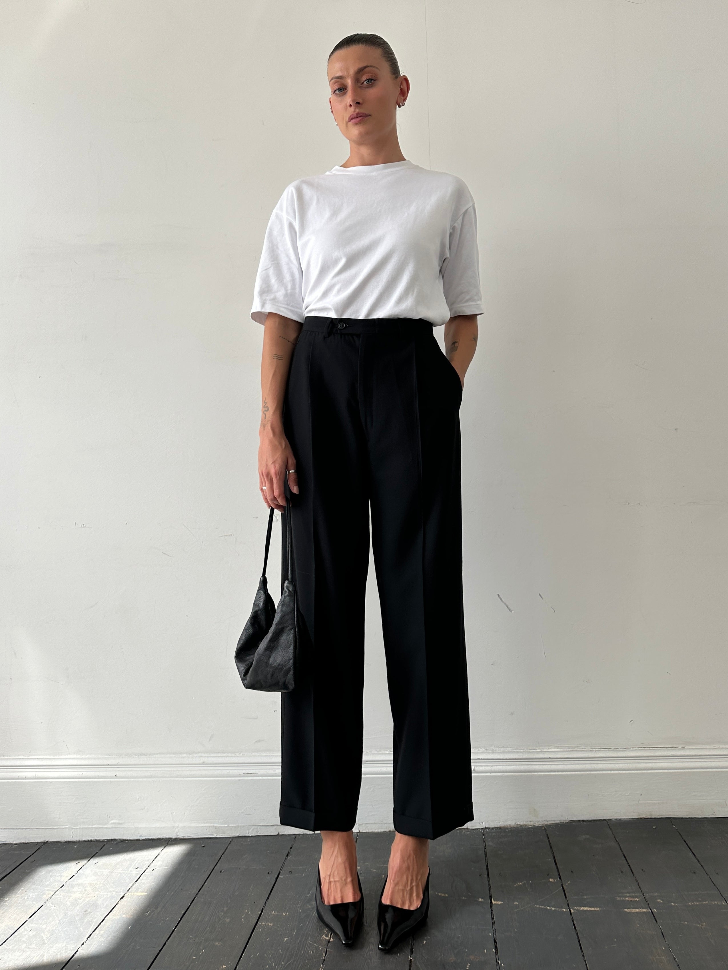 Vintage pure wool tailored tuxedo trousers with straight leg fit and W32 size, shown hanging on a rack.