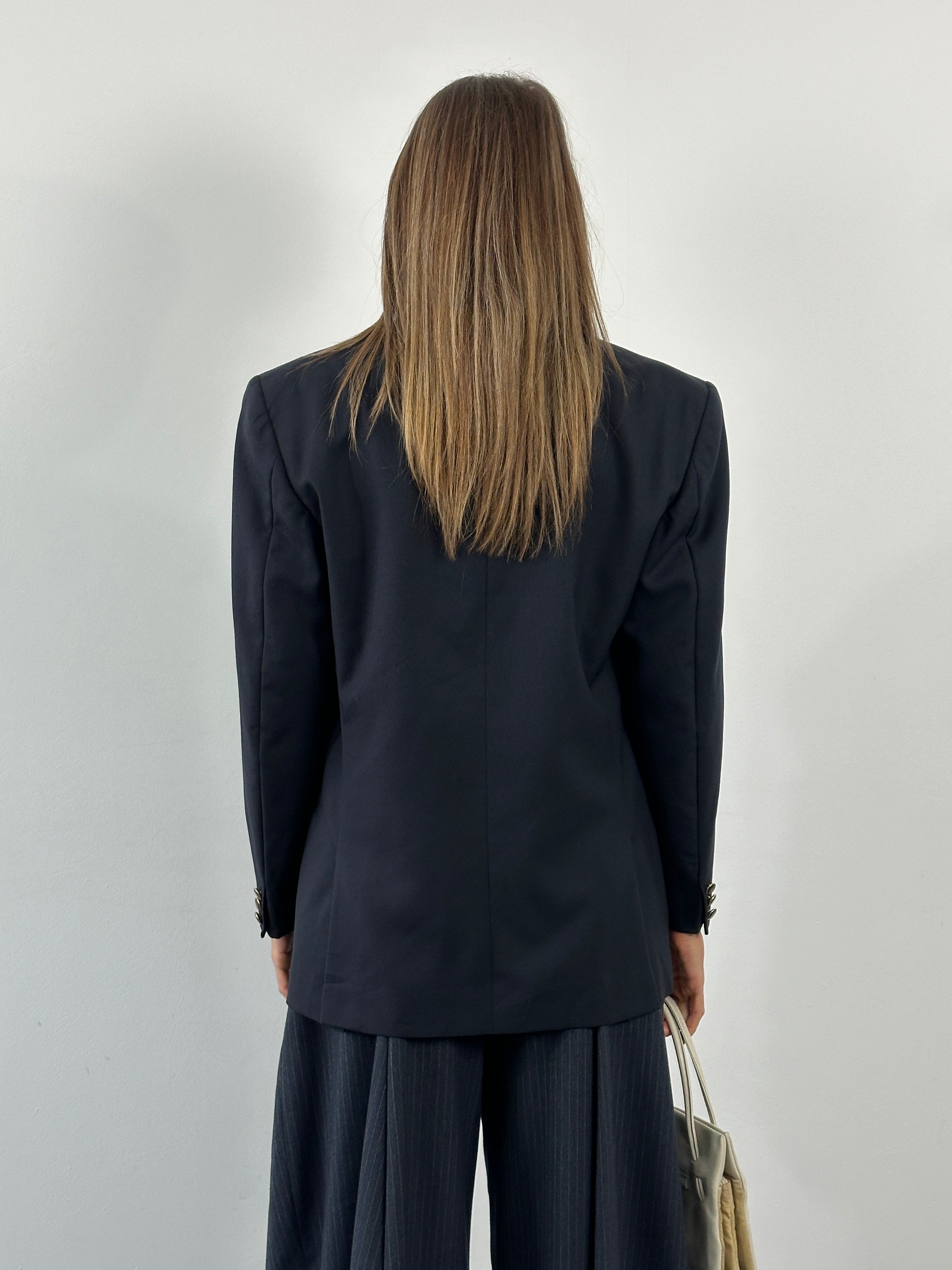 Yves Saint Laurent 1990s bespoke button wool double-breasted blazer in navy, size 38R/M, tailored fit with classic lapel details.
