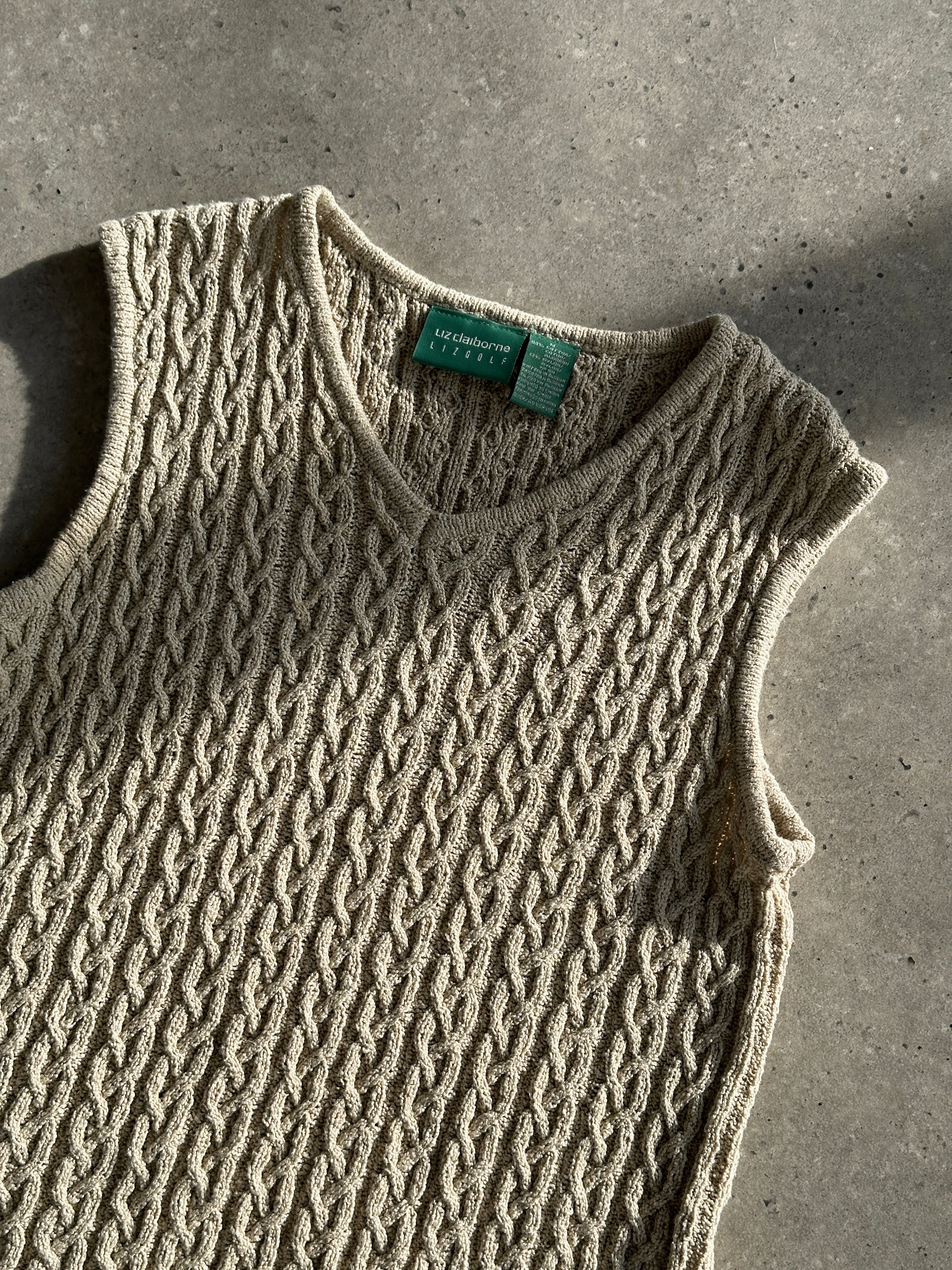 Vintage cotton Aran knit vest in size S/M, featuring textured knit pattern and classic design, perfect for layered autumn style.