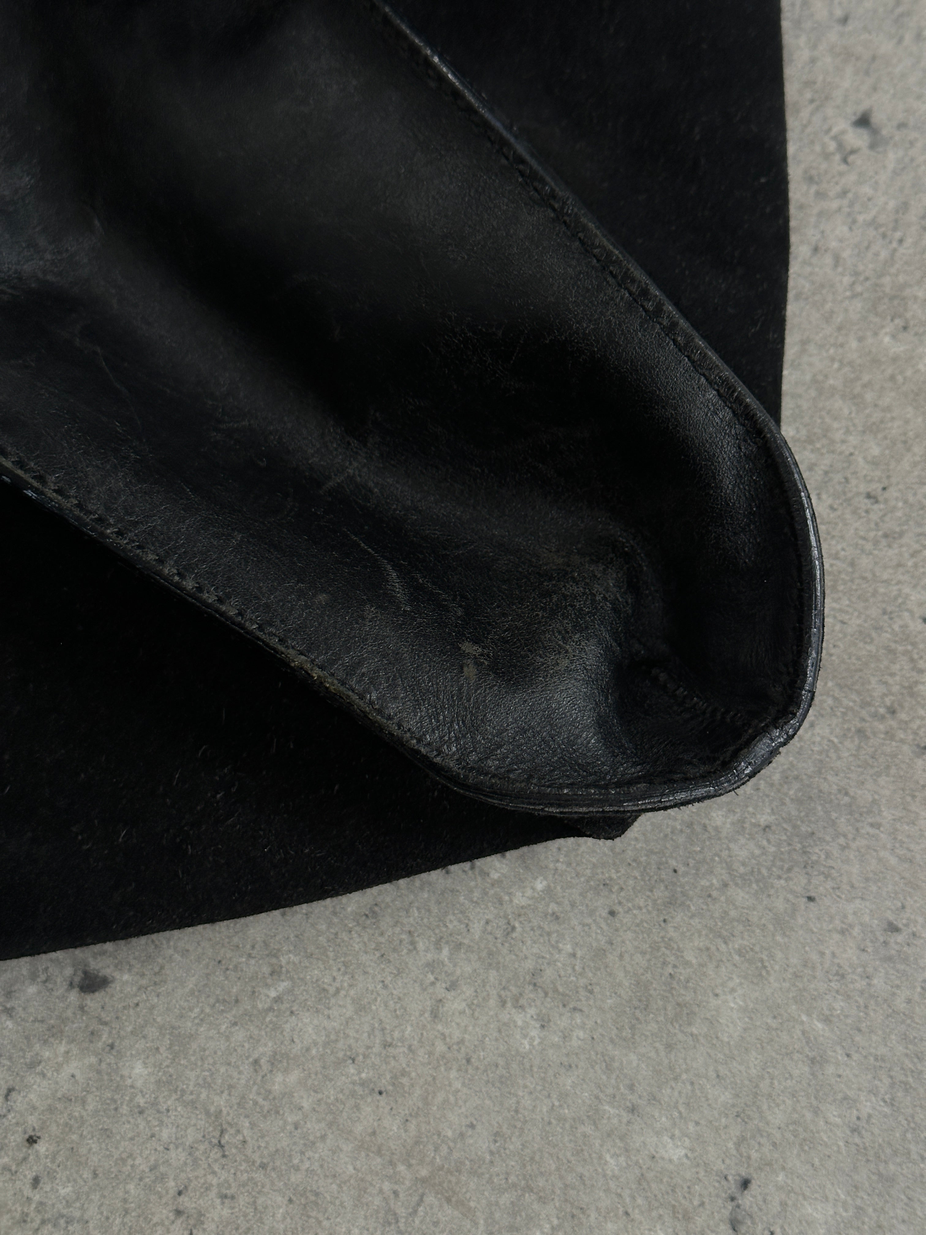 Gucci 1990s Tom Ford suede leather hobo shoulder bag with slouchy design and subtle logo details.