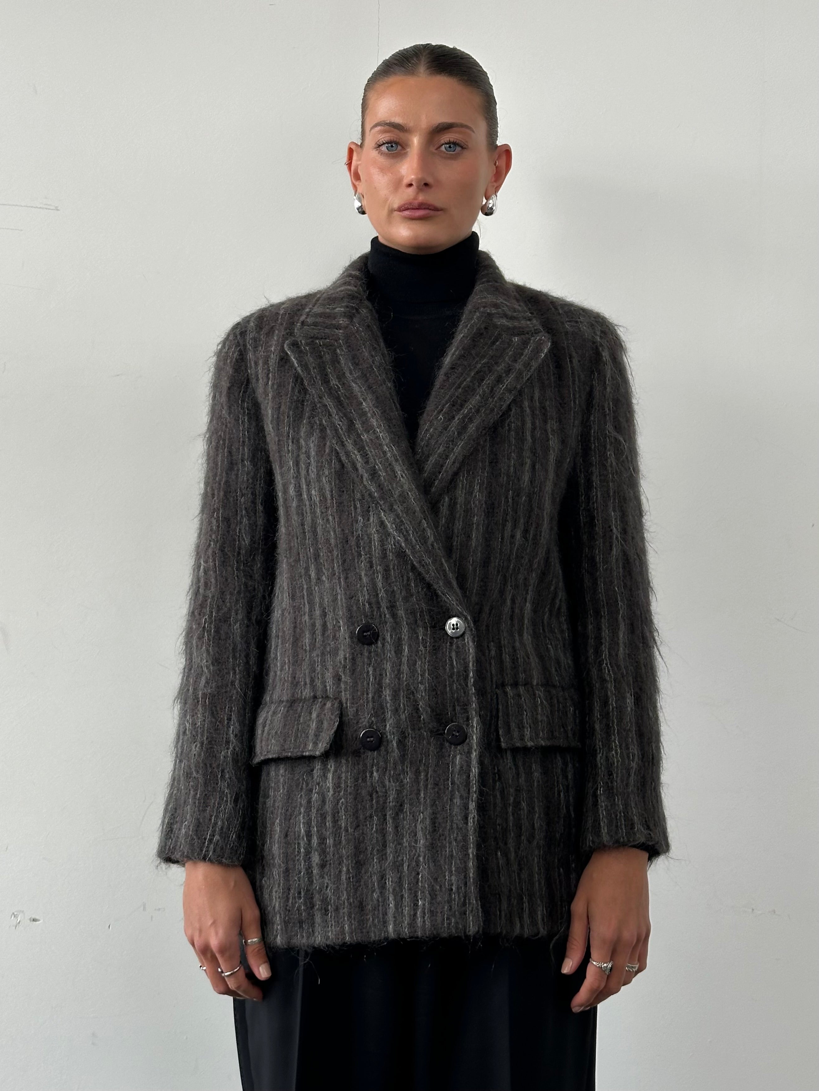 Jaeger mohair fuzzy stripe double-breasted coat in size M, featuring a stylish pattern and tailored fit, displayed on a hanger.
