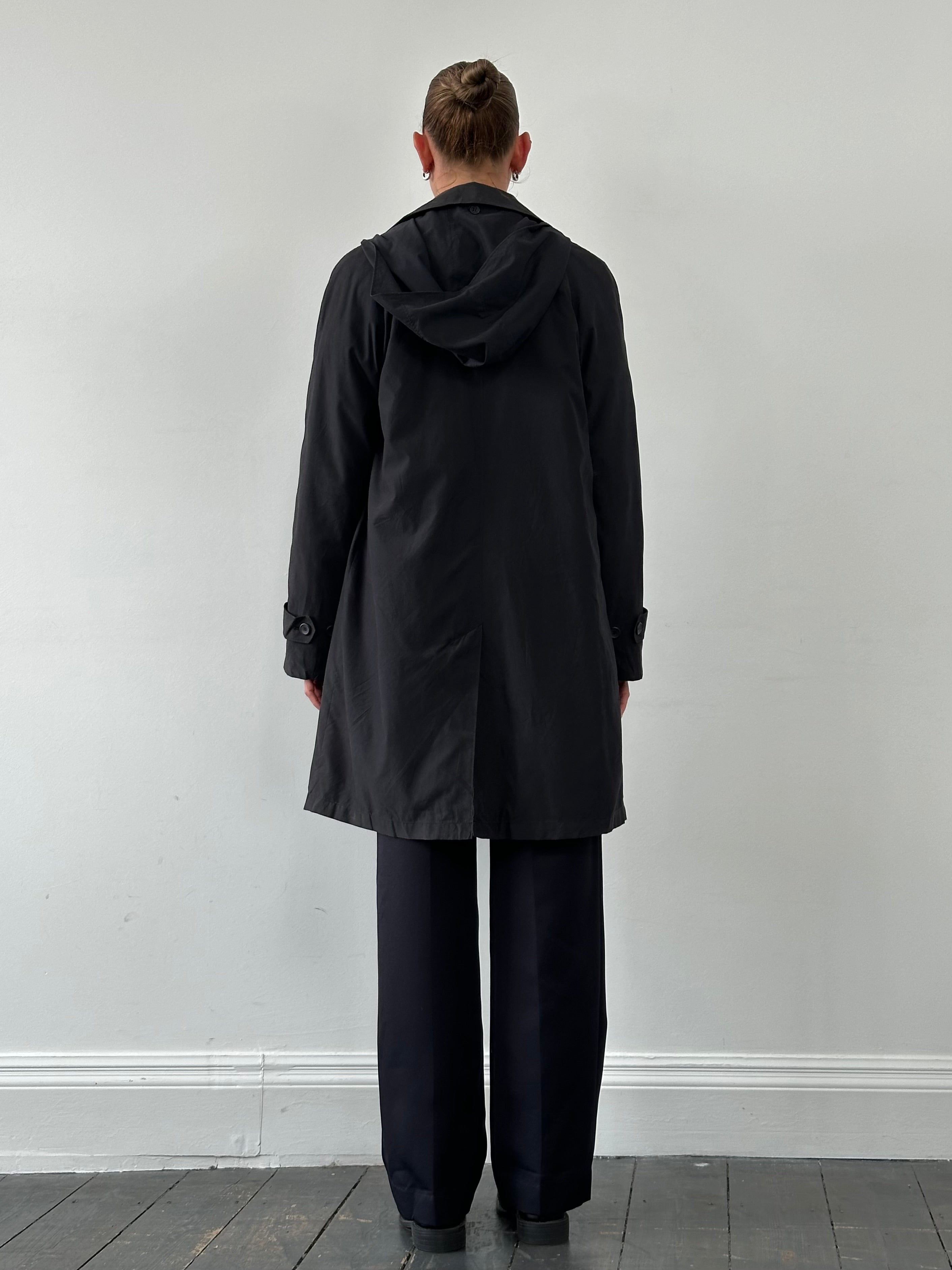 London Fog concealed placket hooded trench coat for men, shown in a classic beige color with a hood and concealed front buttons.