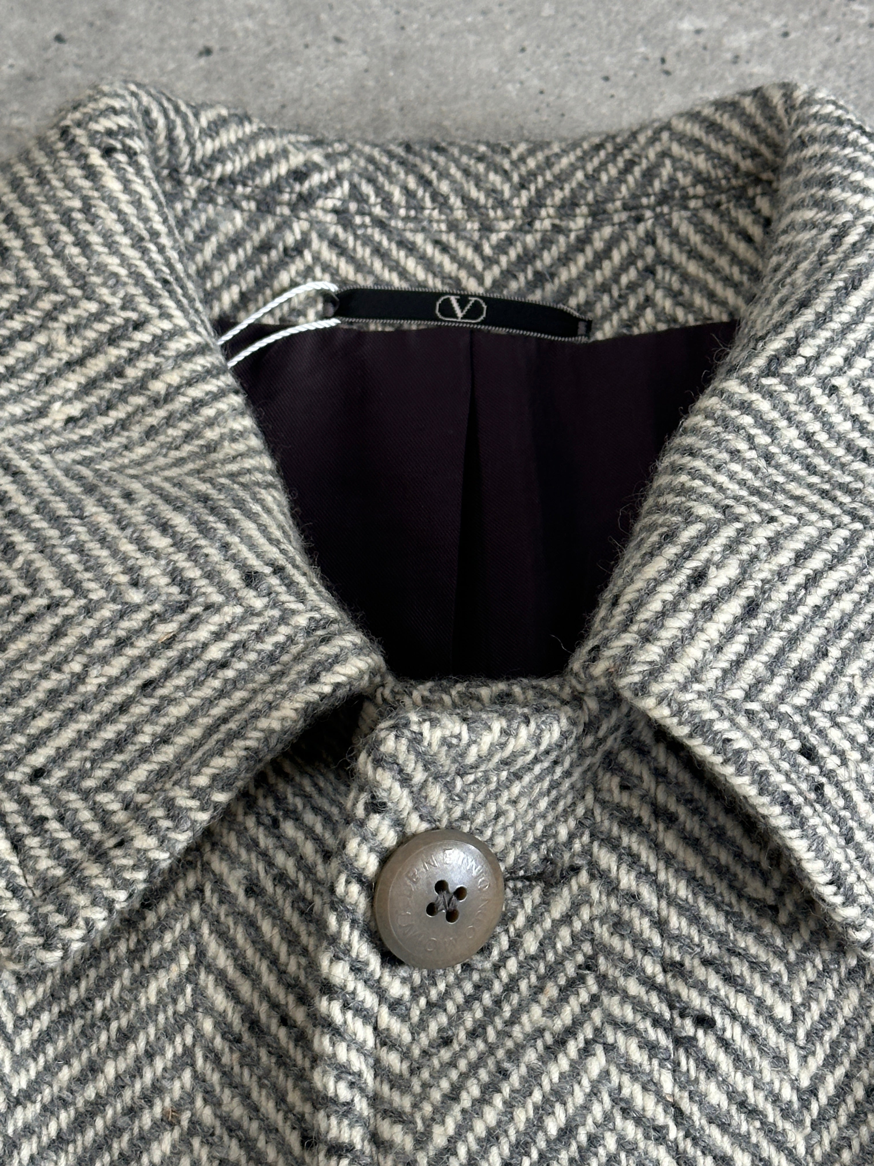Valentino 1990s pure wool herringbone belted coat in XL/XXL, showcasing classic tailored design and herringbone pattern.