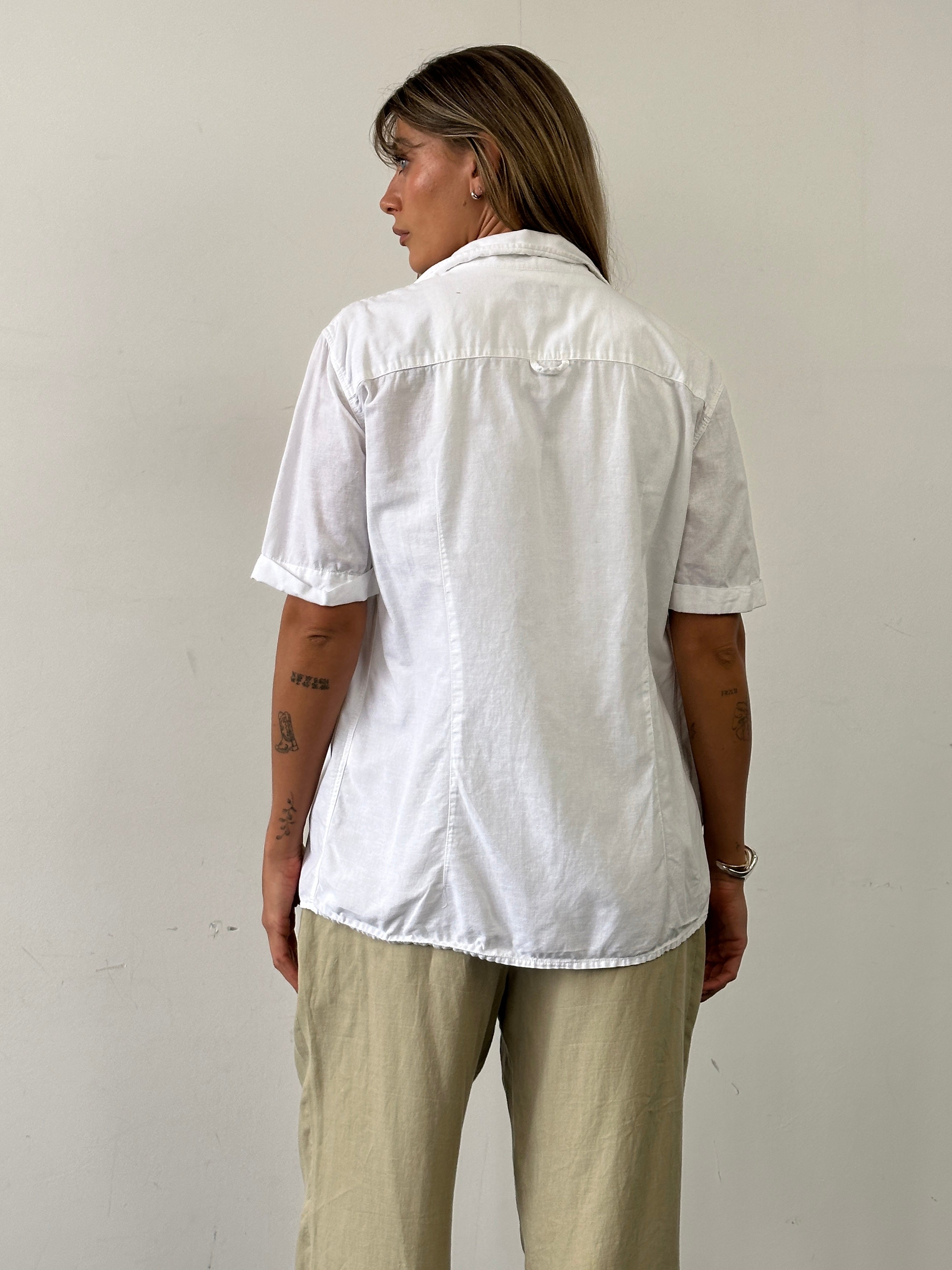 Armani Jeans cotton linen short sleeve logo shirt in size M/L, featuring a casual design with the Armani branding on the chest.
