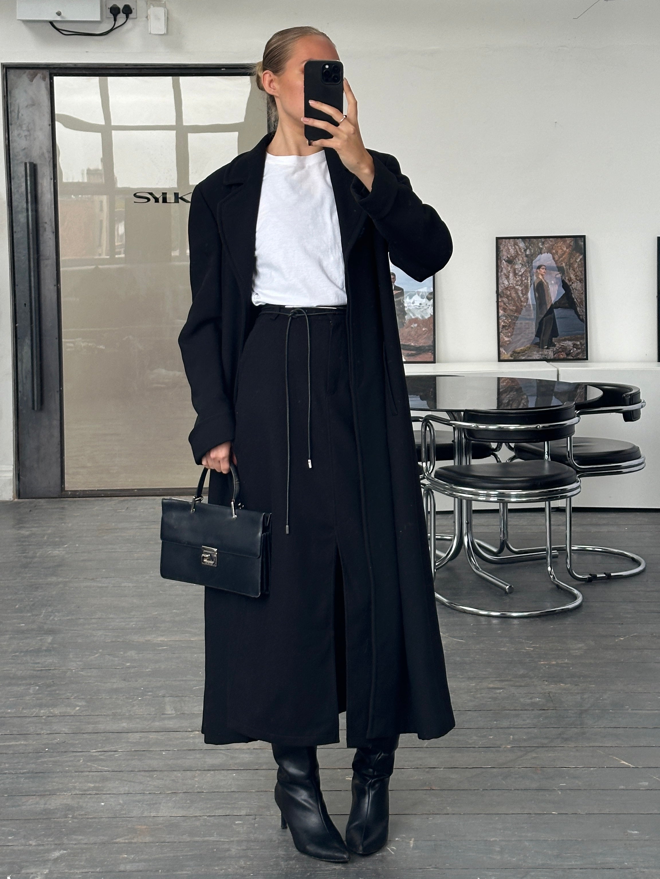 Giorgio Armani 1990s pure wool floor-length coat in classic design, shown hanging with a tailored silhouette and neutral color