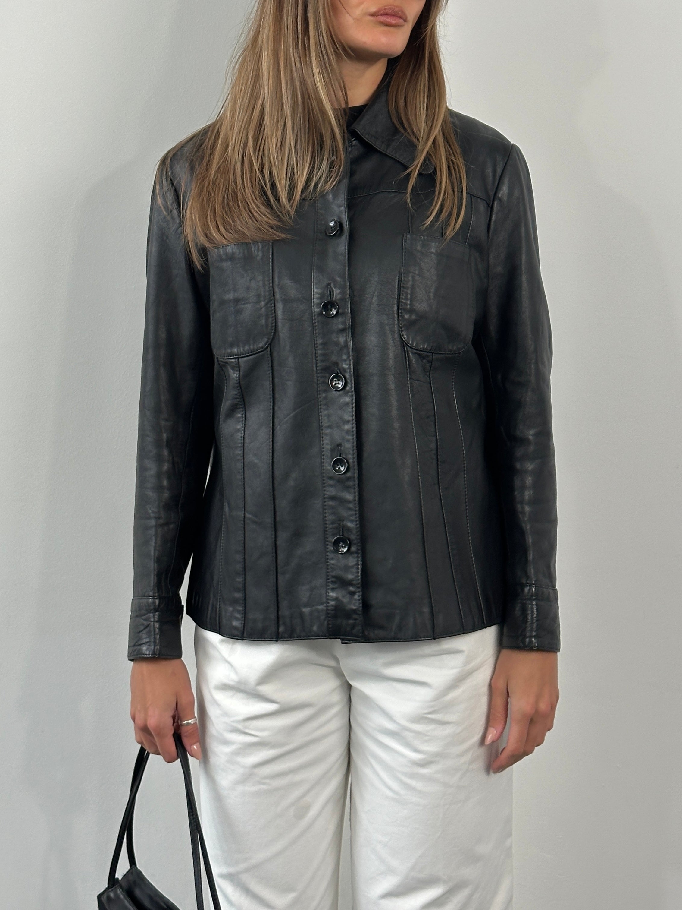 Vintage 1990s Dagger Collar leather jacket, medium size, featuring classic design and authentic leather texture.