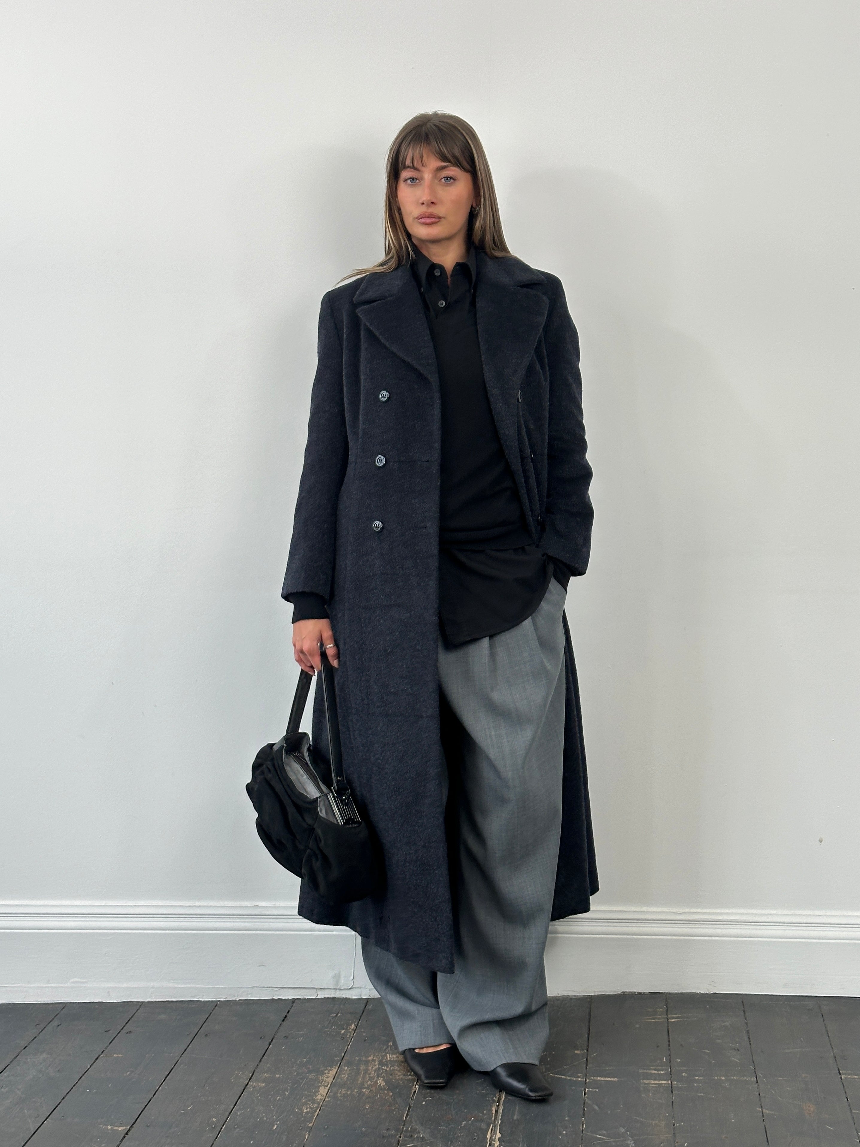 Vintage 1990s wool mohair double-breasted coat in size S/M, featuring classic design and textured fabric.
