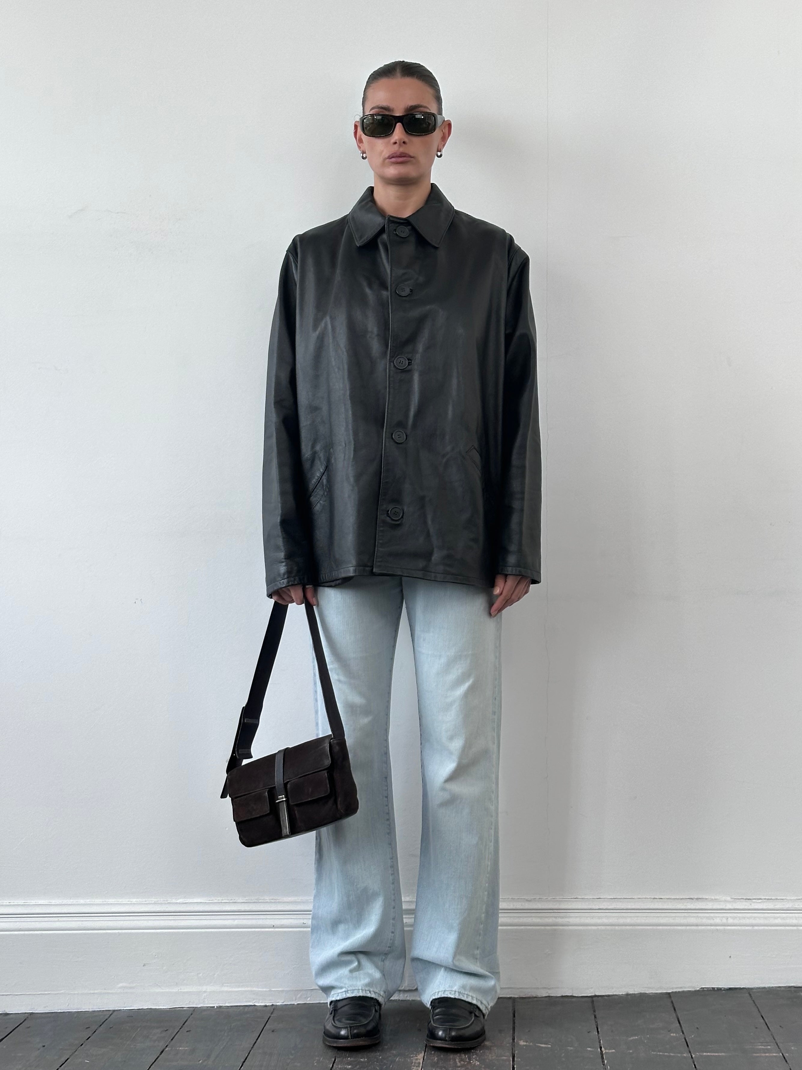 Vintage Italian vintage smooth leather jacket in size L, featuring classic design and high-quality leather detail.