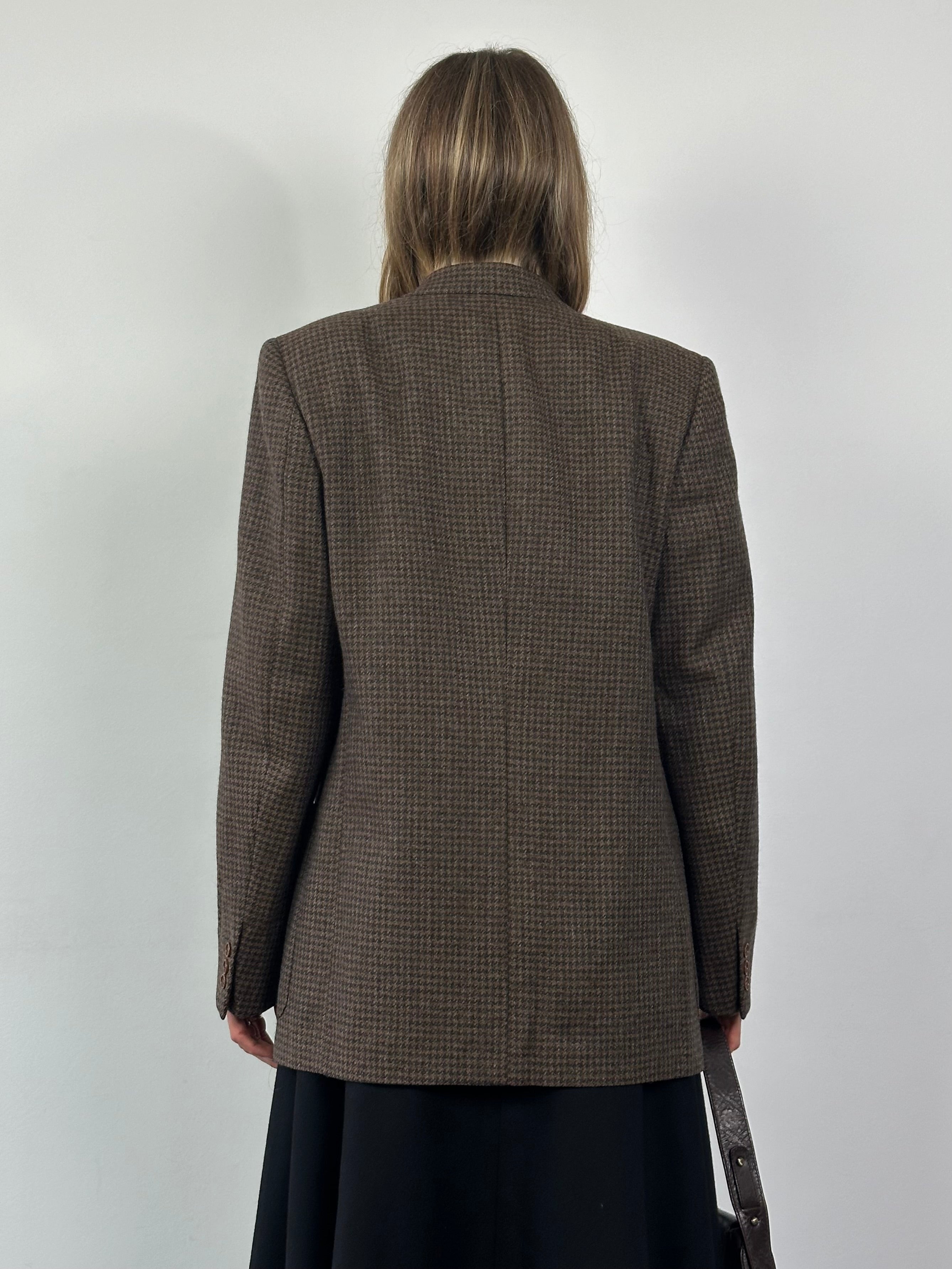 Yves Saint Laurent circa 80s wool tweed single-breasted blazer in size L, featuring classic tailored fit and textured fabric.
