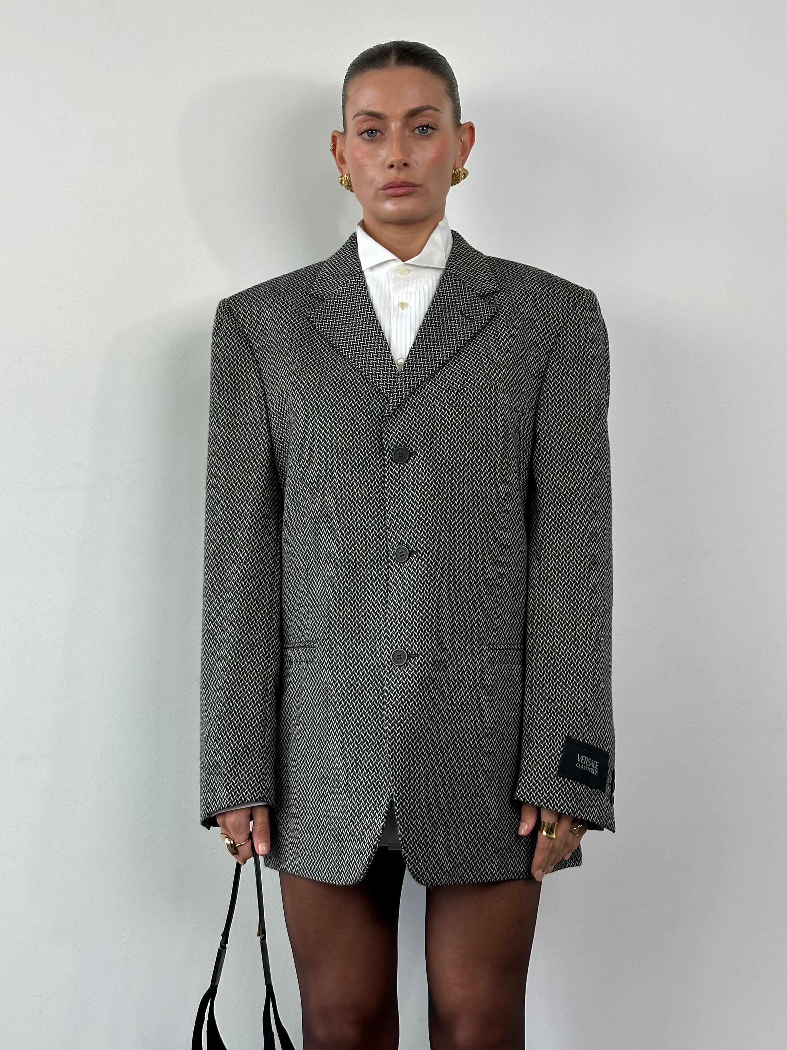 Versace Classic V2 1993 pure wool woven blazer in size 42R/XL, featuring tailored fit and detailed stitching.