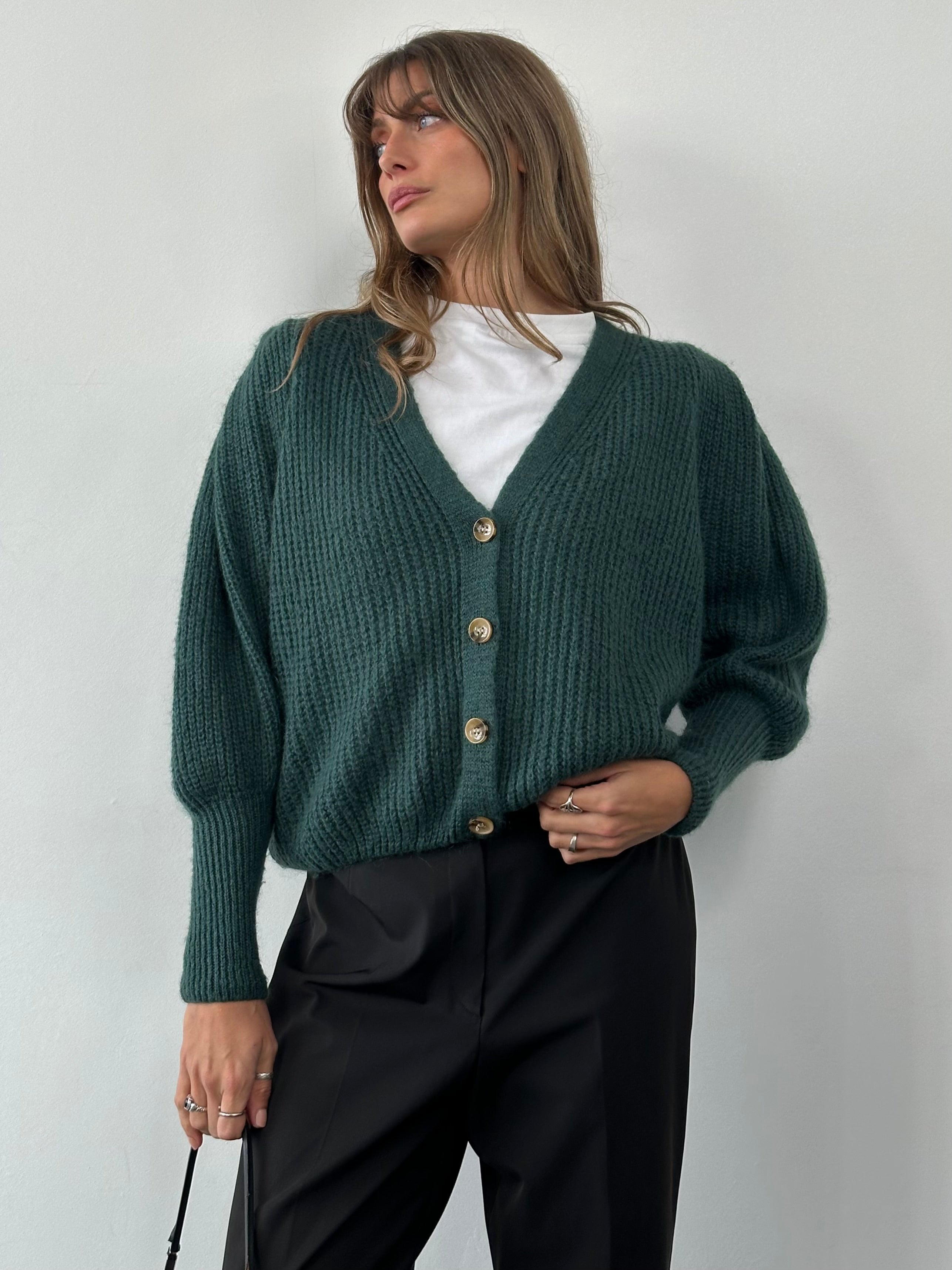 Vintage Italian mohair cardigan with ruched details, in size M, featuring a soft, textured knit for a cozy, stylish look.