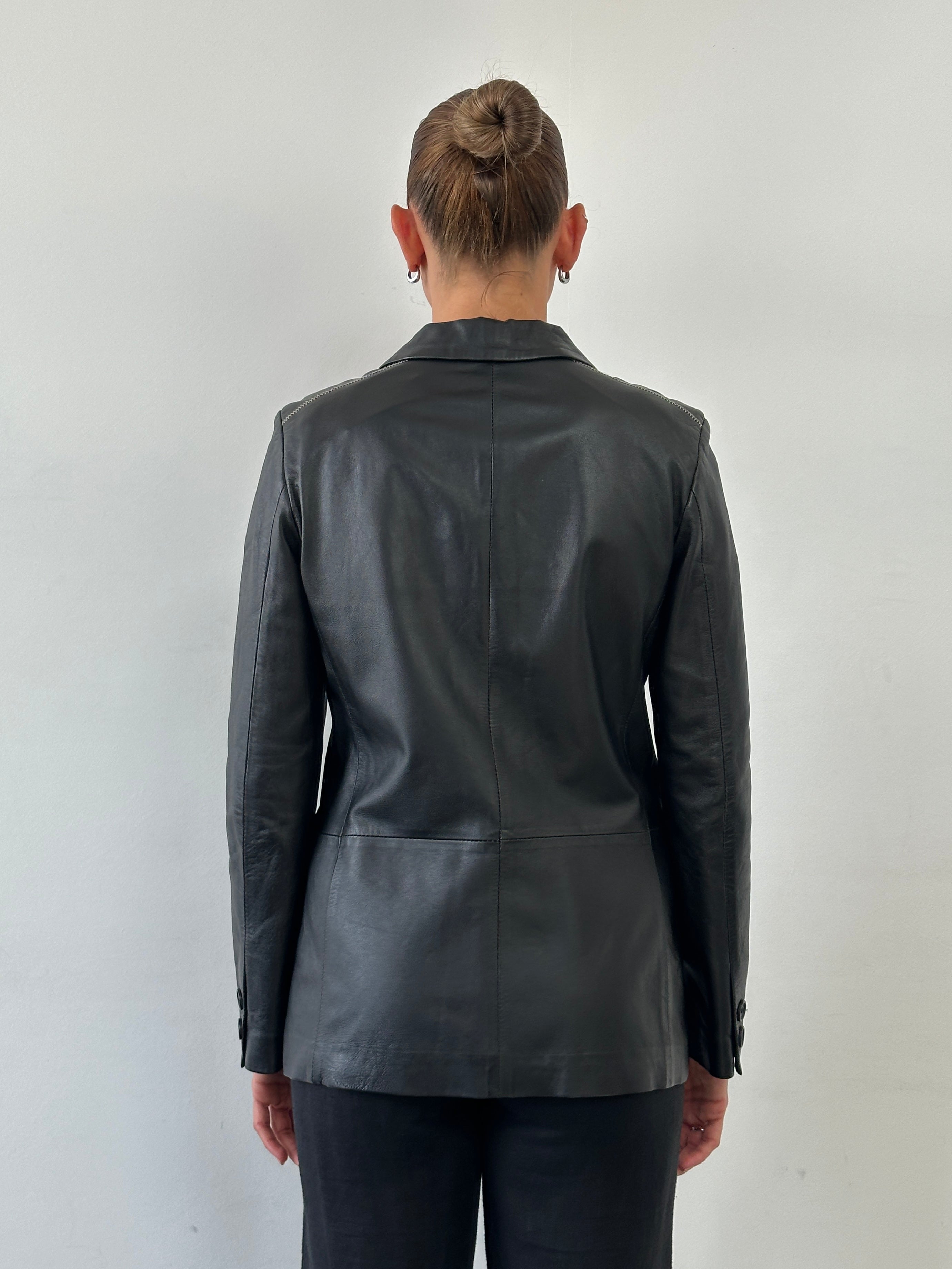 Conbipel single-breasted leather blazer jacket in black, tailored fit with lapel collar and sleek design for men.