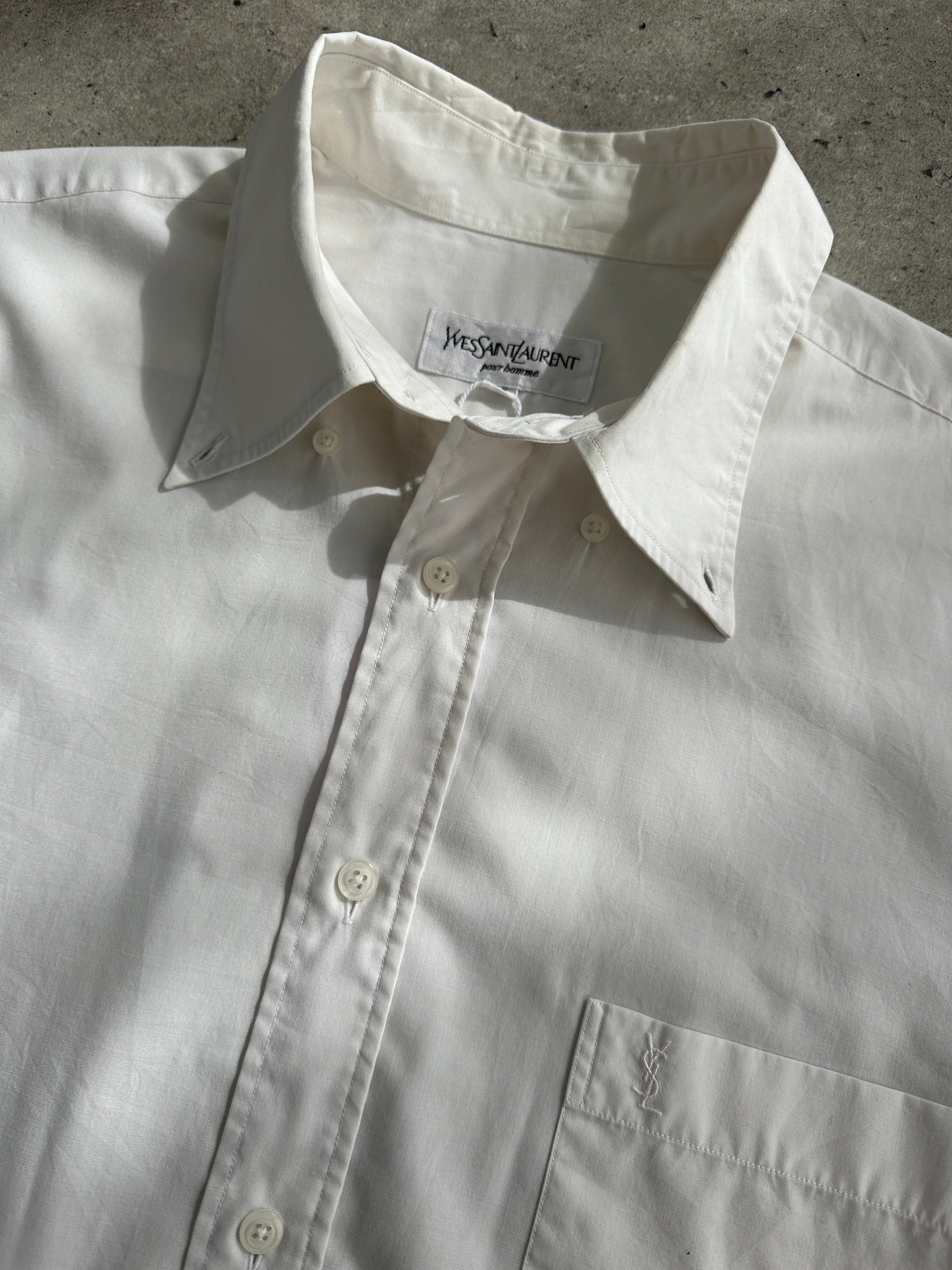 Yves Saint Laurent 90s cotton logo shirt in XL, featuring classic design and bold branding, displayed on a hanger.