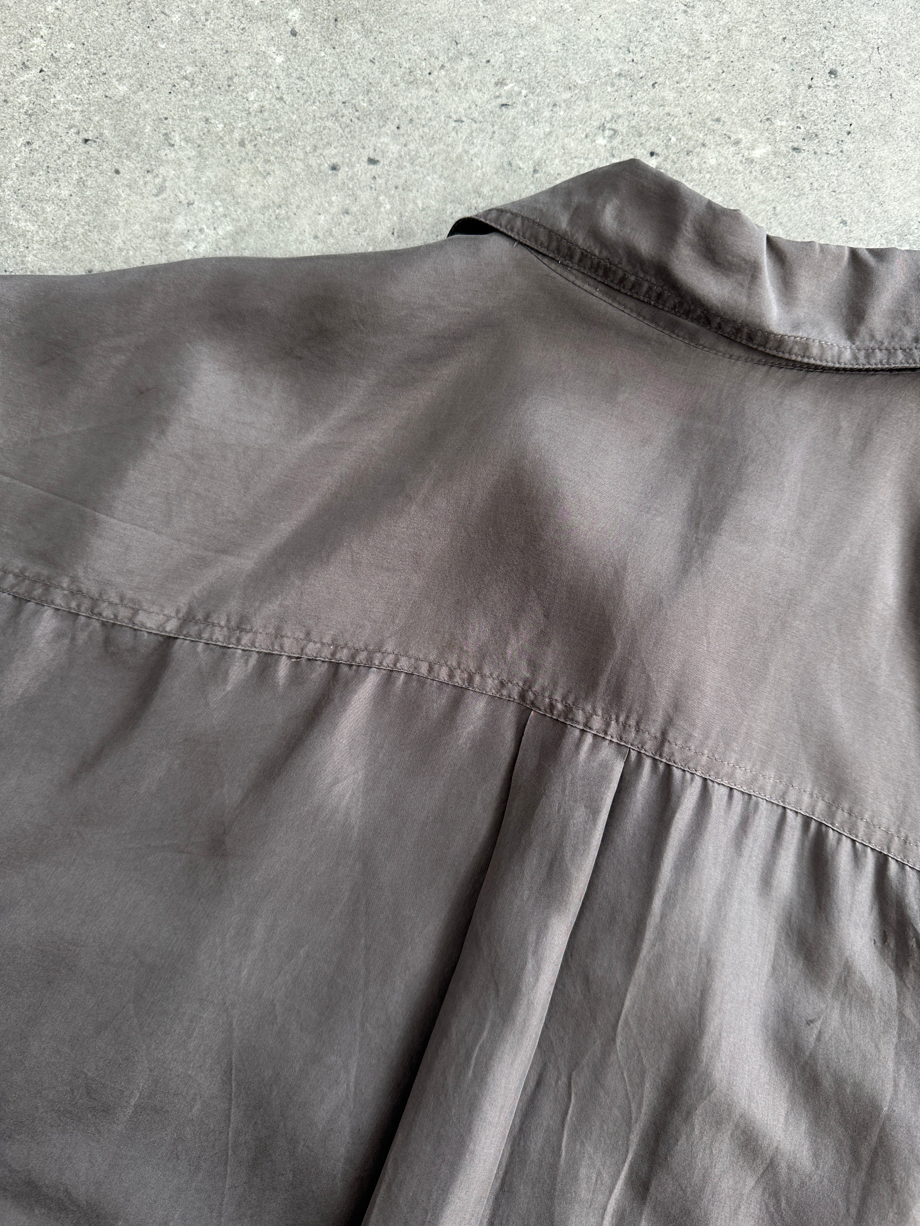 Vintage pure silk shirt in XL size, featuring a smooth, shiny fabric and classic design, displayed on a neutral background.