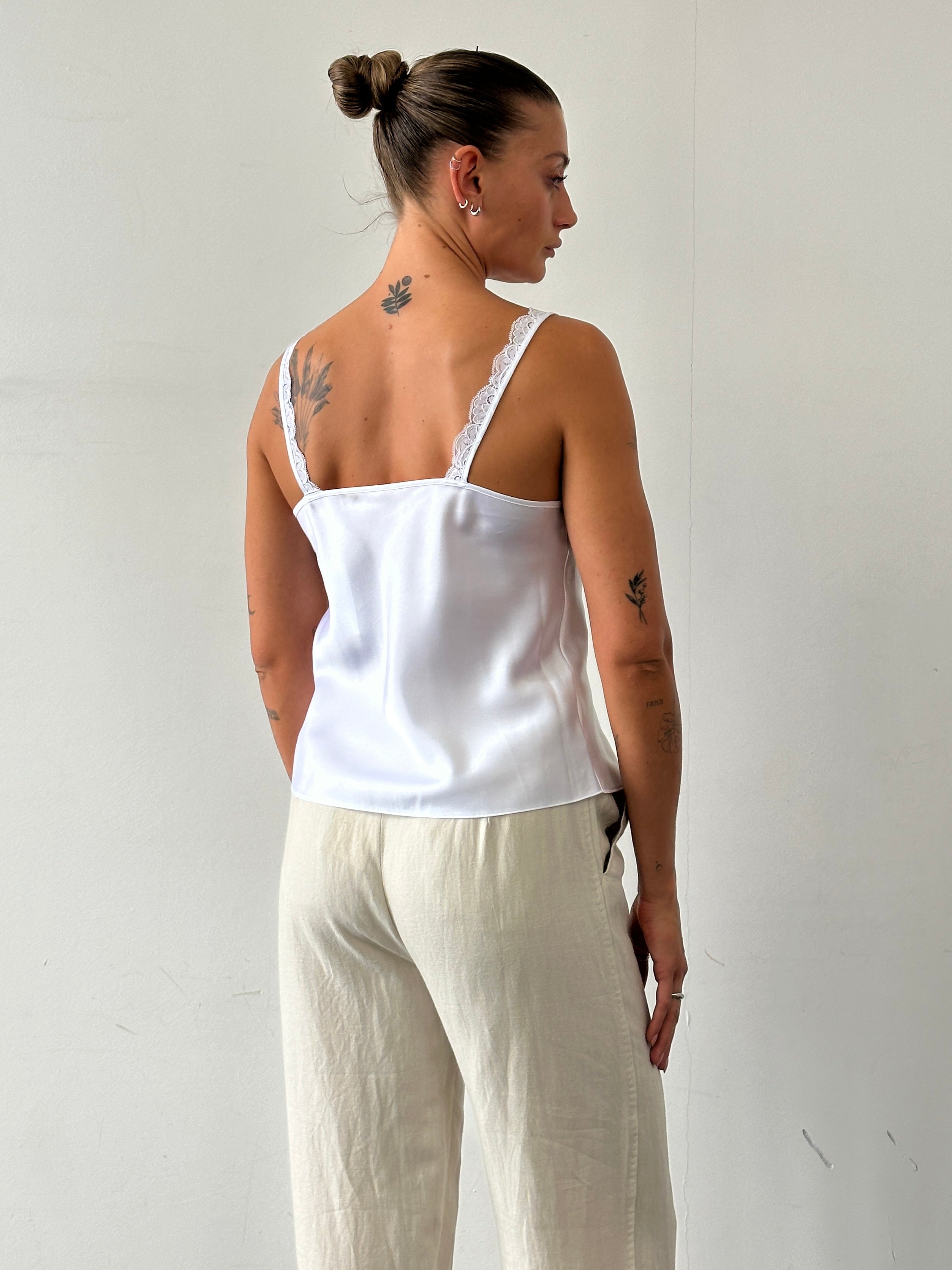 St Michael 90s satin lace cami top in size M, featuring a silky fabric and delicate lace details, shown on a hanger.