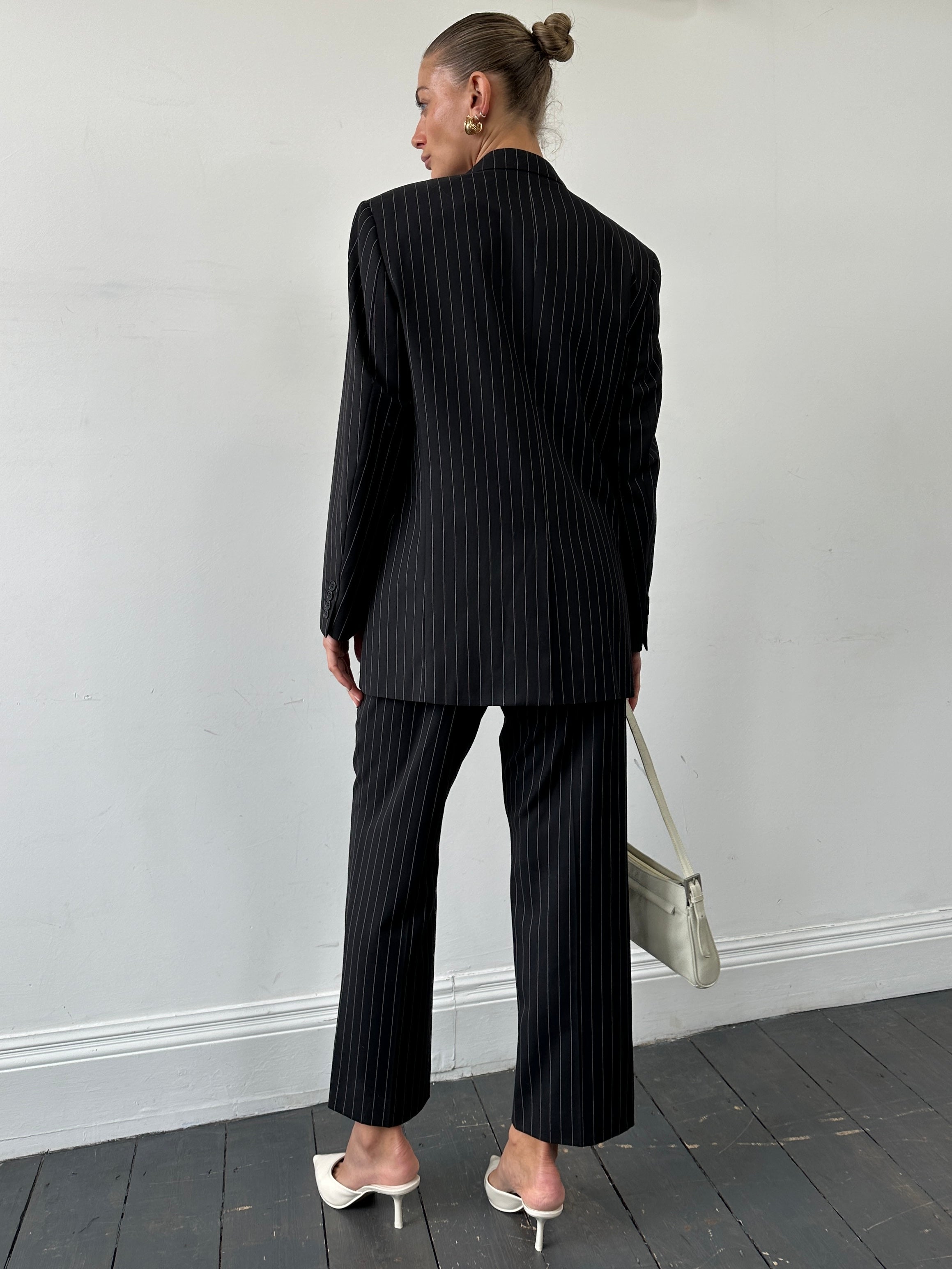Yves Saint Laurent Pour Homme pinstripe pure wool single-breasted suit jacket in size 38S, displayed on a hanger.