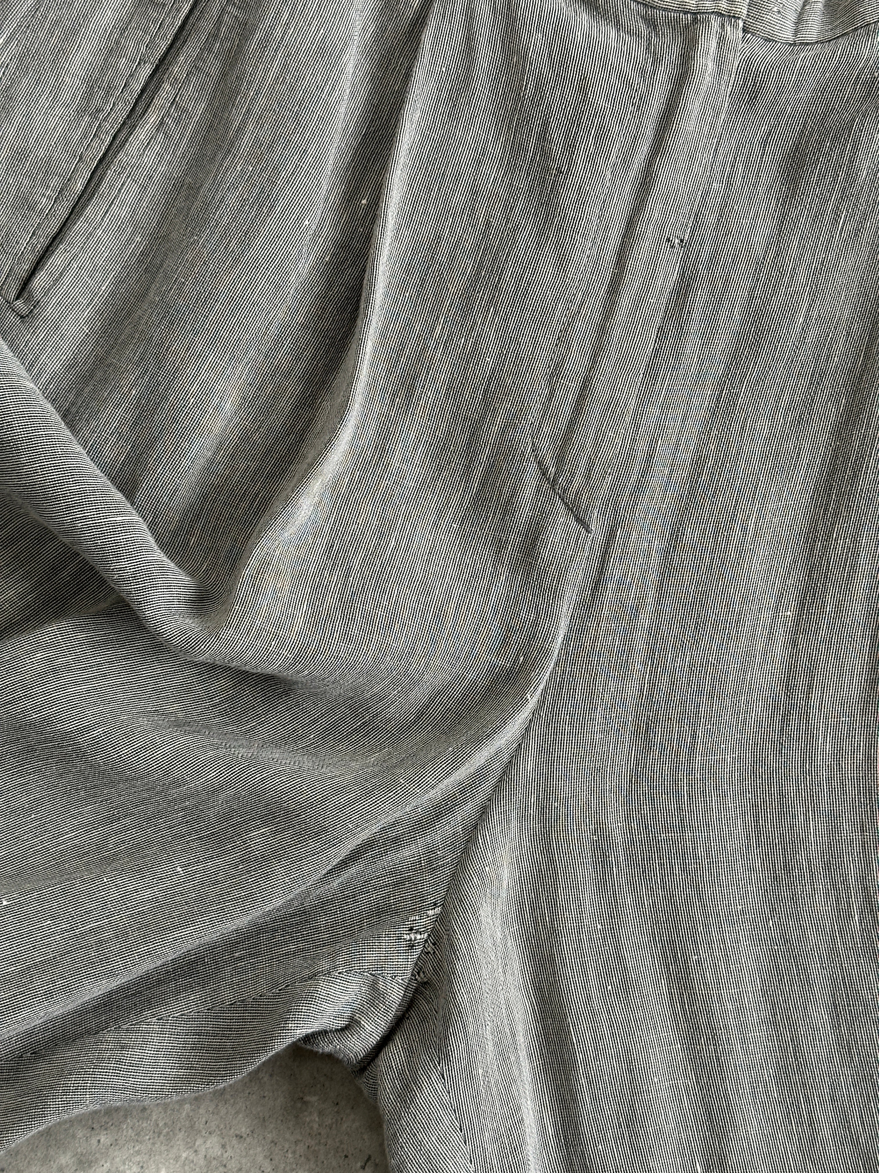 Mani linen two-piece top and trouser co-ord set, featuring lightweight fabric and tailored fit, shown in a stylish design.