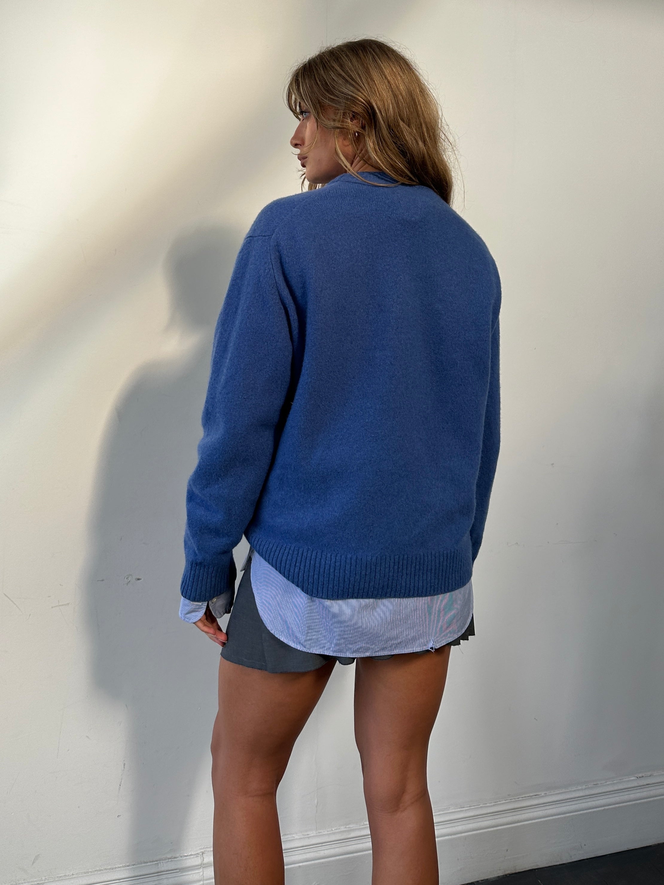 Burberry London pure wool logo jumper in size L, featuring a classic design and visible branding on the front.