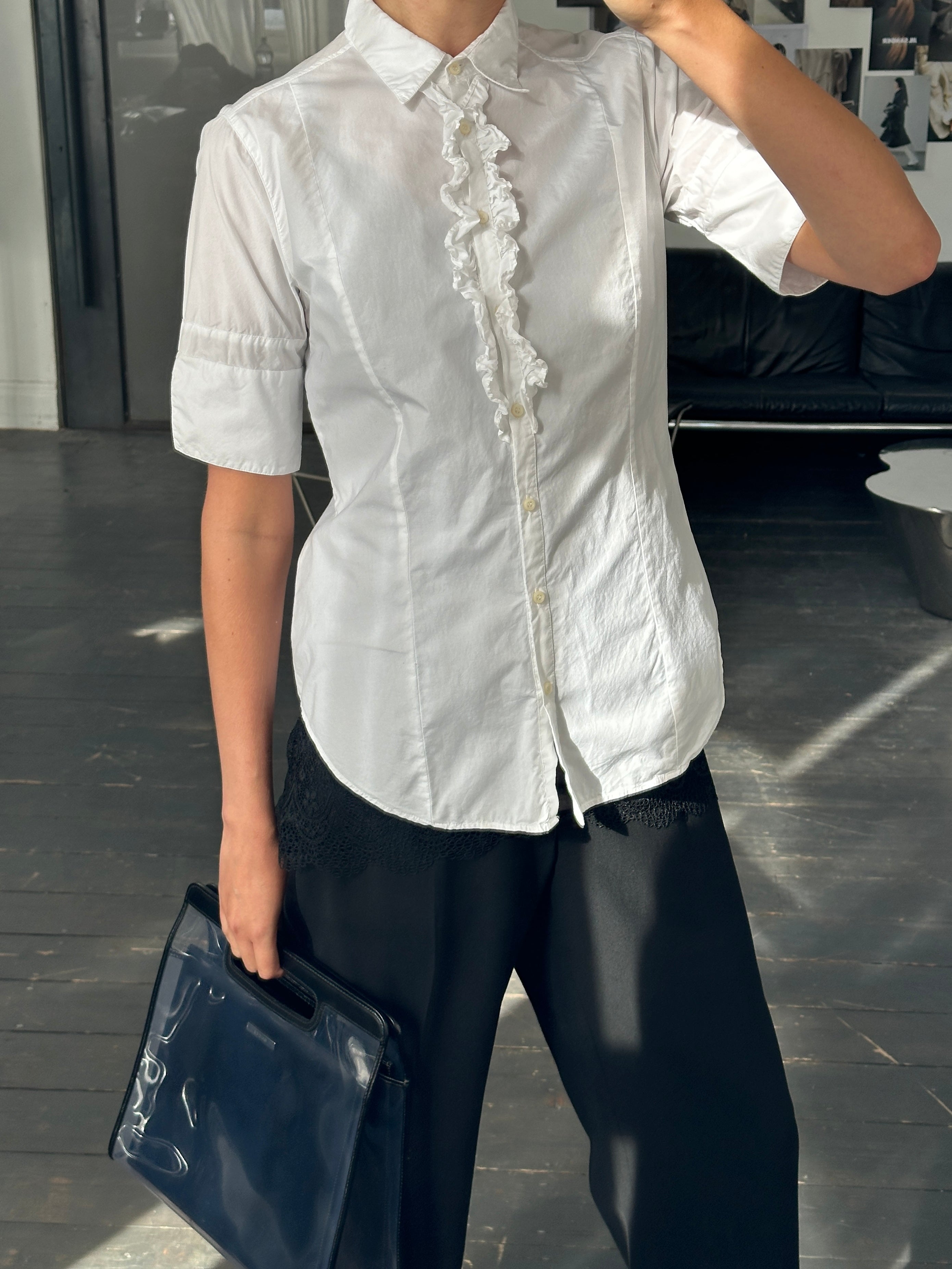 Vintage 1990s short sleeve ruffle shirt in size M, featuring a classic design with feminine ruffle details and retro style.