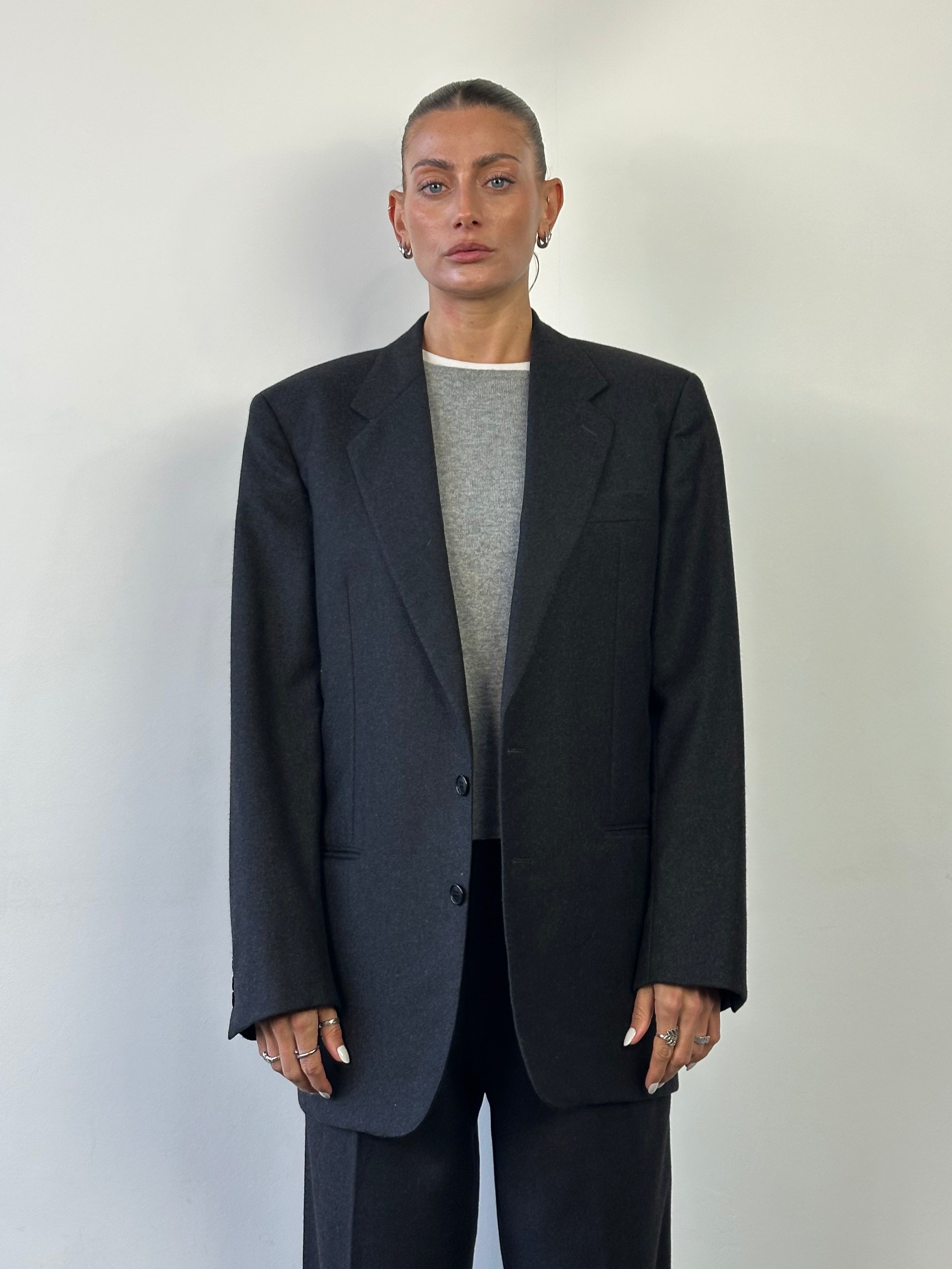 Cerruti Spinnaker Italian brushed wool single-breasted blazer in size 40R/L, featuring classic notch lapels and tailored fit.