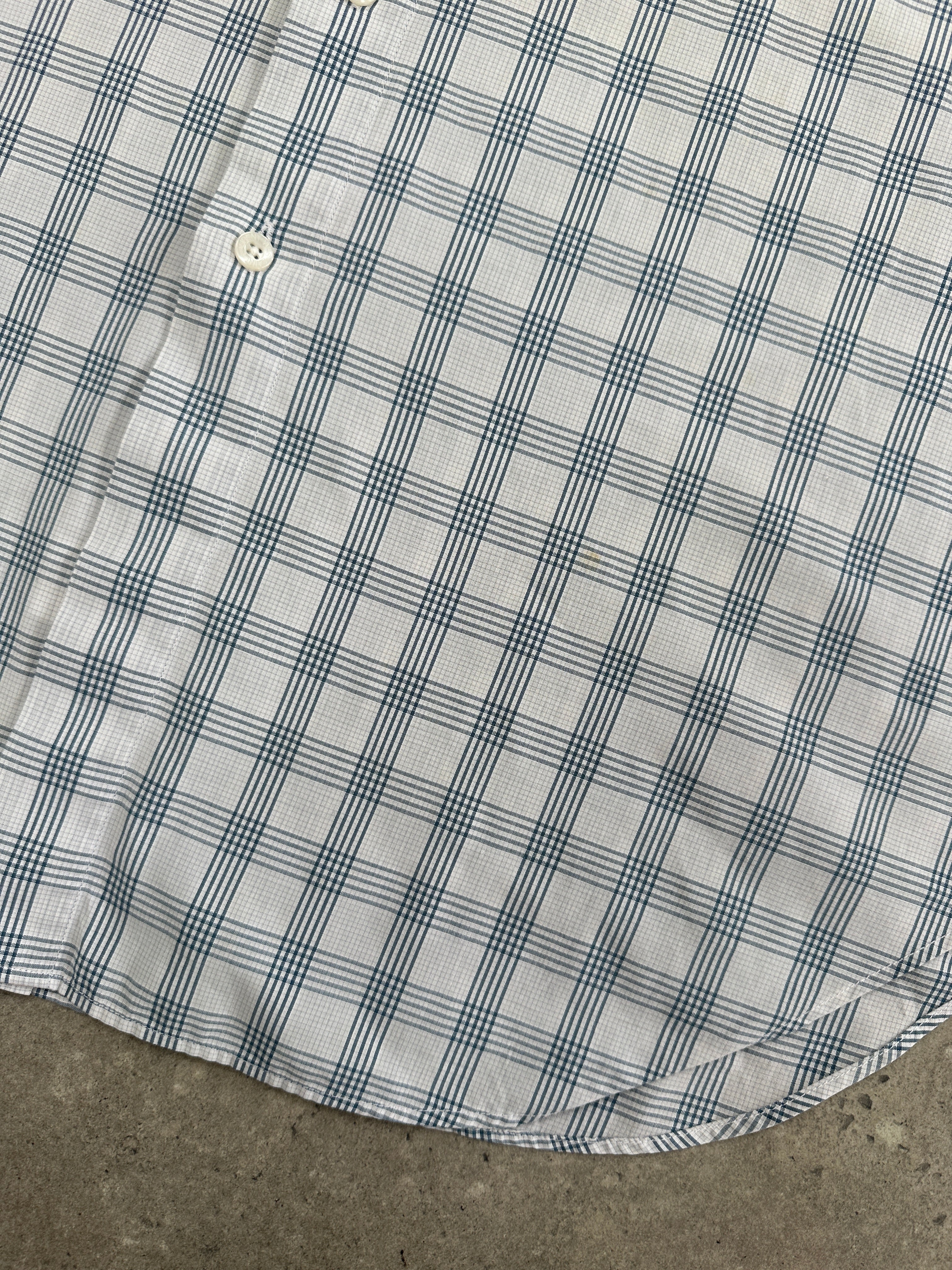 Yves Saint Laurent men's short sleeve logo shirt with blue and white cotton check pattern, size XL, front view.