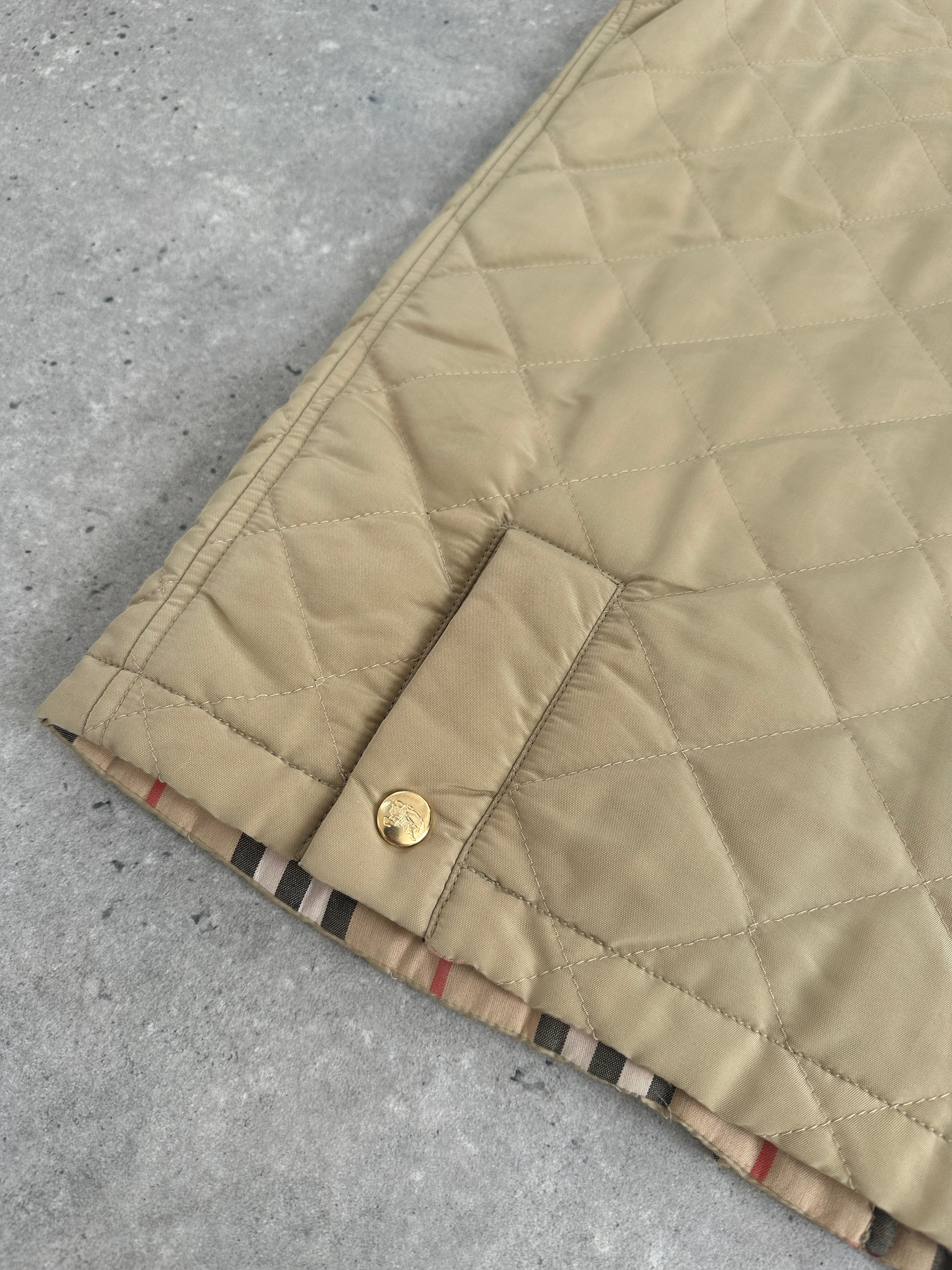Burberry 1990s nylon bespoke button Nova Check gilet in beige and brown, size M, featuring a classic check pattern and front buttons.