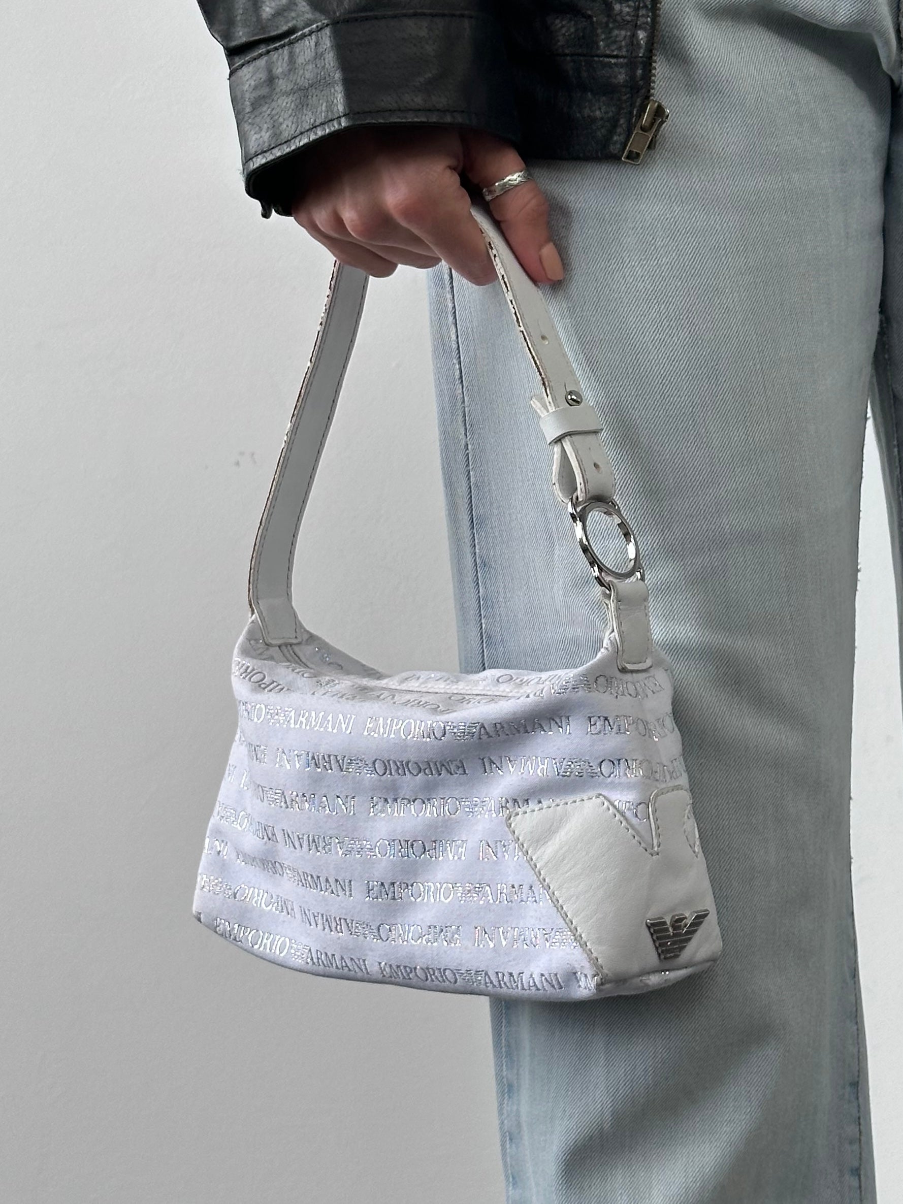 Emporio Armani Monogram Shoulder Bag with leather strap and signature logo pattern, stylish accessory for everyday use.