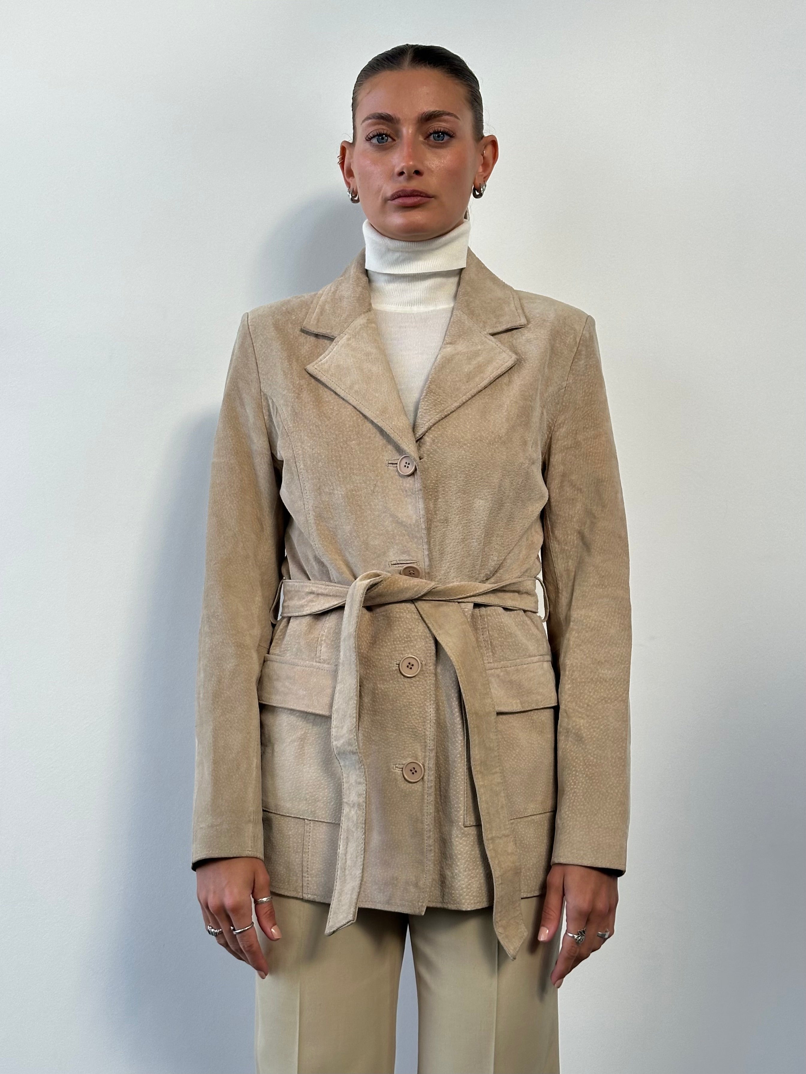 Vintage belted suede jacket, size M, showcasing classic style with a tailored fit and vintage-inspired design.