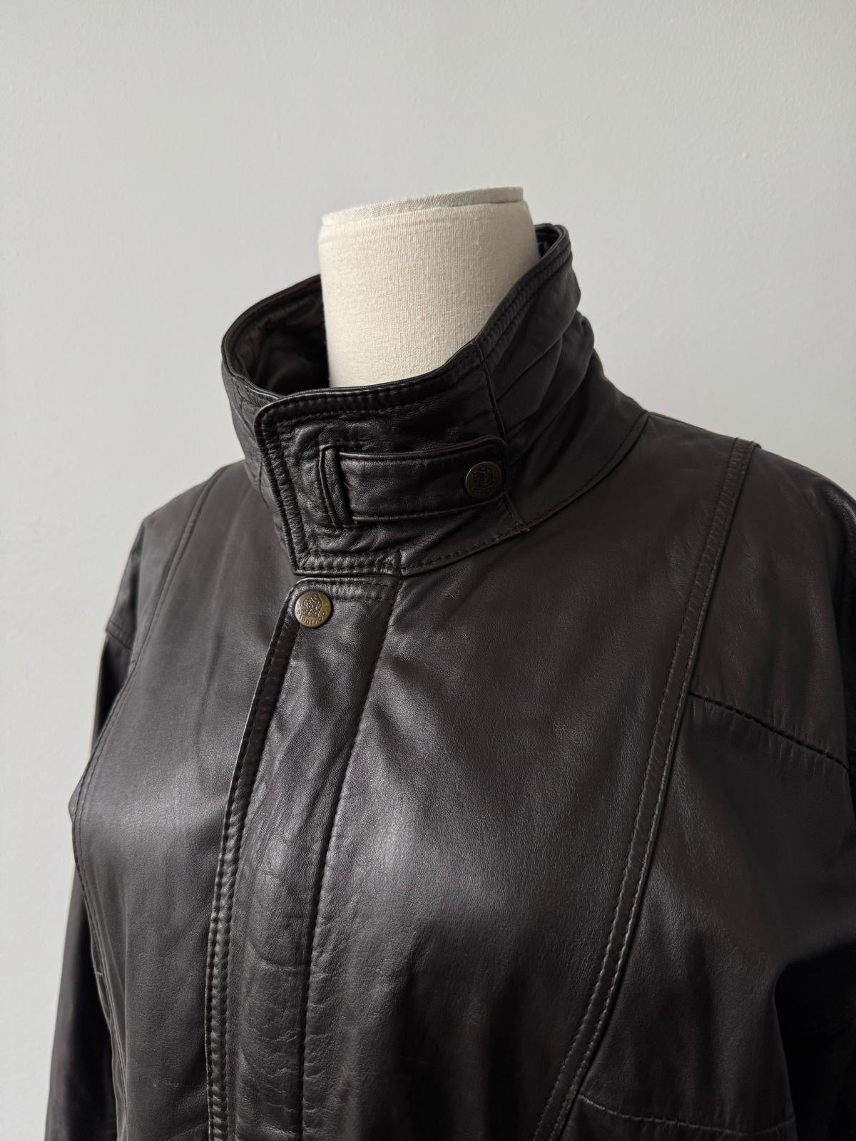 Valentino 1990s high neck leather bomber jacket in black, featuring a sleek design and classic fit.
