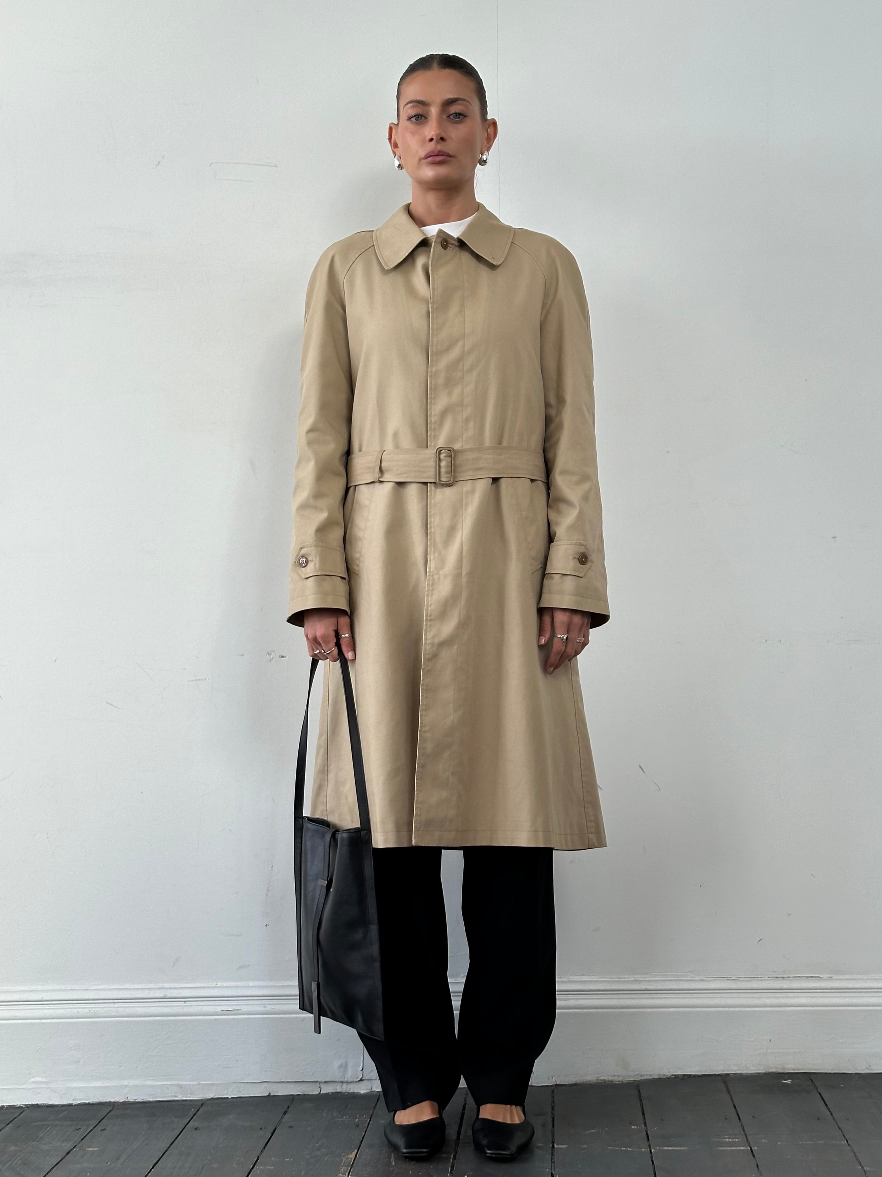 Vintage cotton belted trench coat in XL size, classic design with double-breasted front and timeless style.