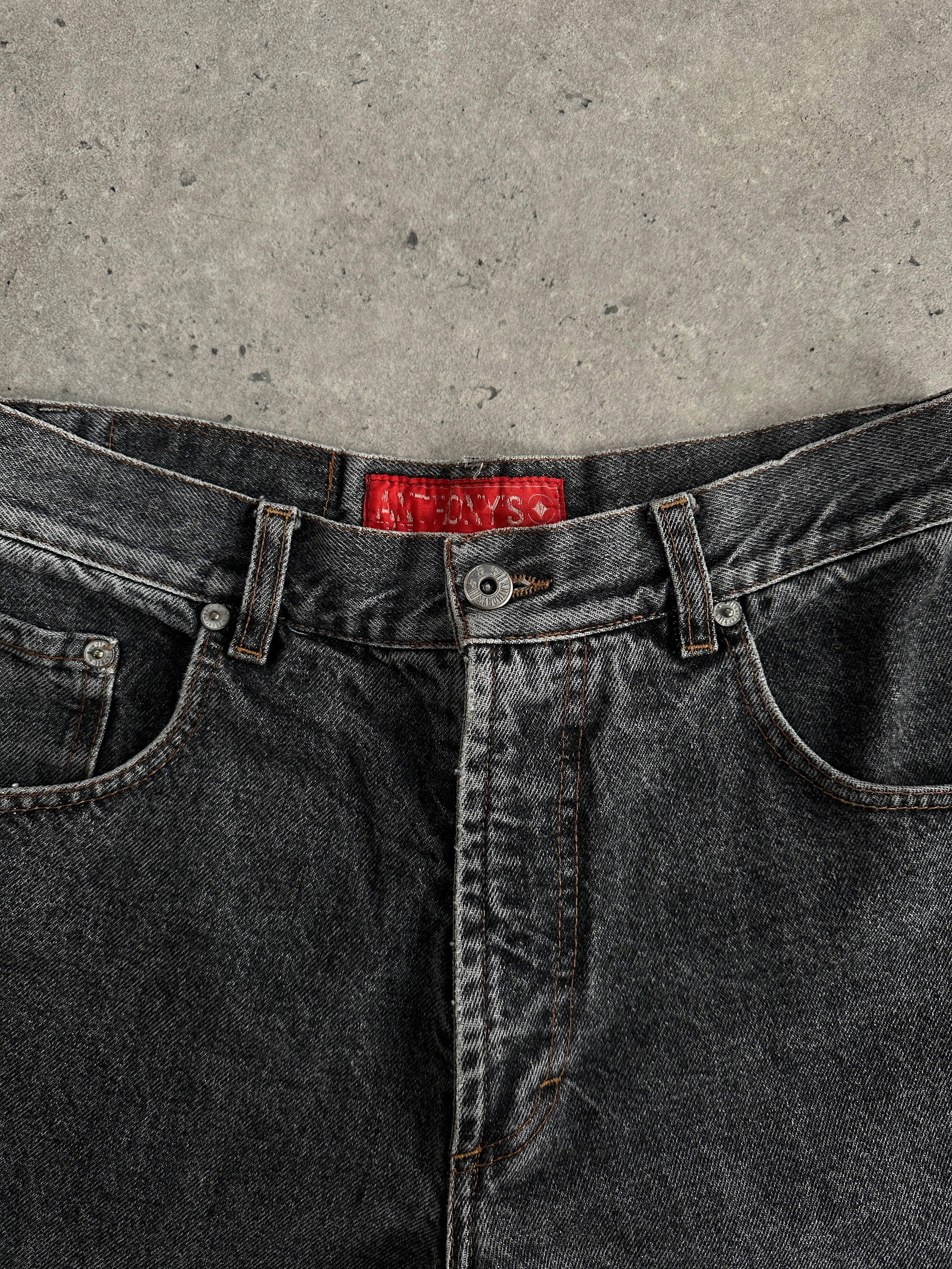 Vintage Italian 1990s high-waisted straight-leg denim jeans with classic blue wash and vintage-style stitching.