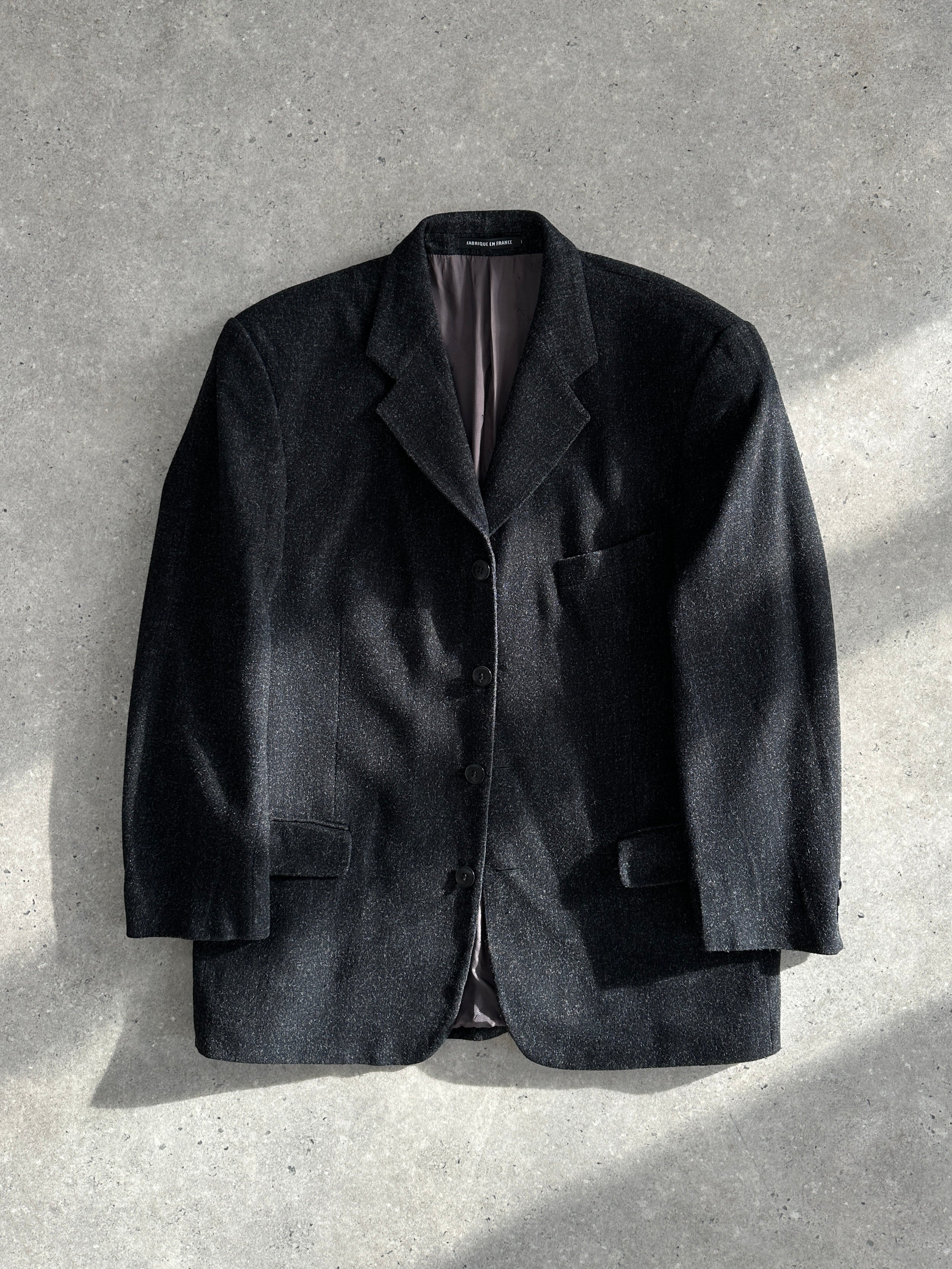 Yves Saint Laurent Pour Homme brushed wool blazer in size L/XL, tailored fit with a classic lapel and textured fabric.