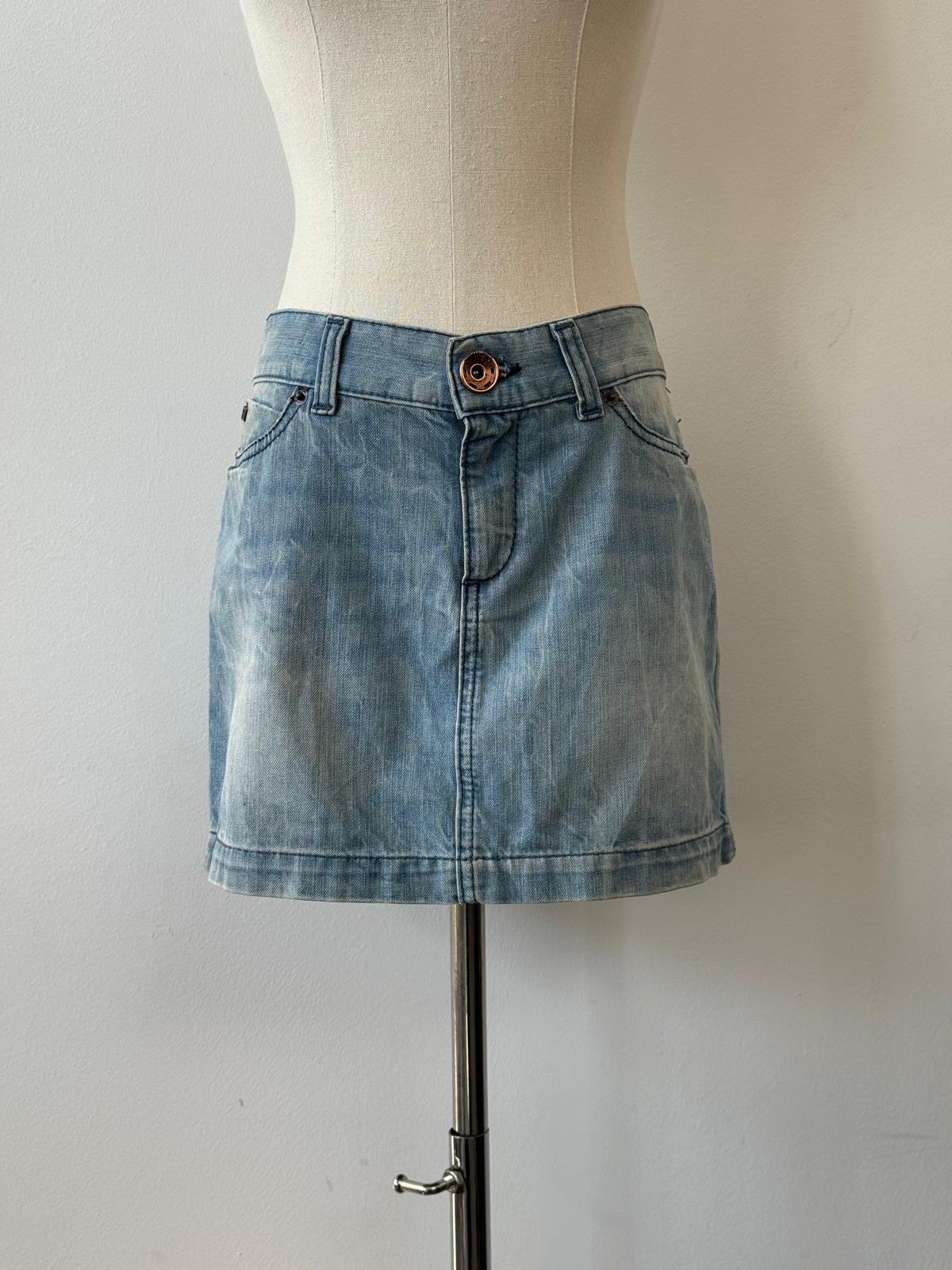 Miss Sixty 2000s denim mini skirt in size W30, stylish high-waisted skirt with classic denim wash and trendy fit.