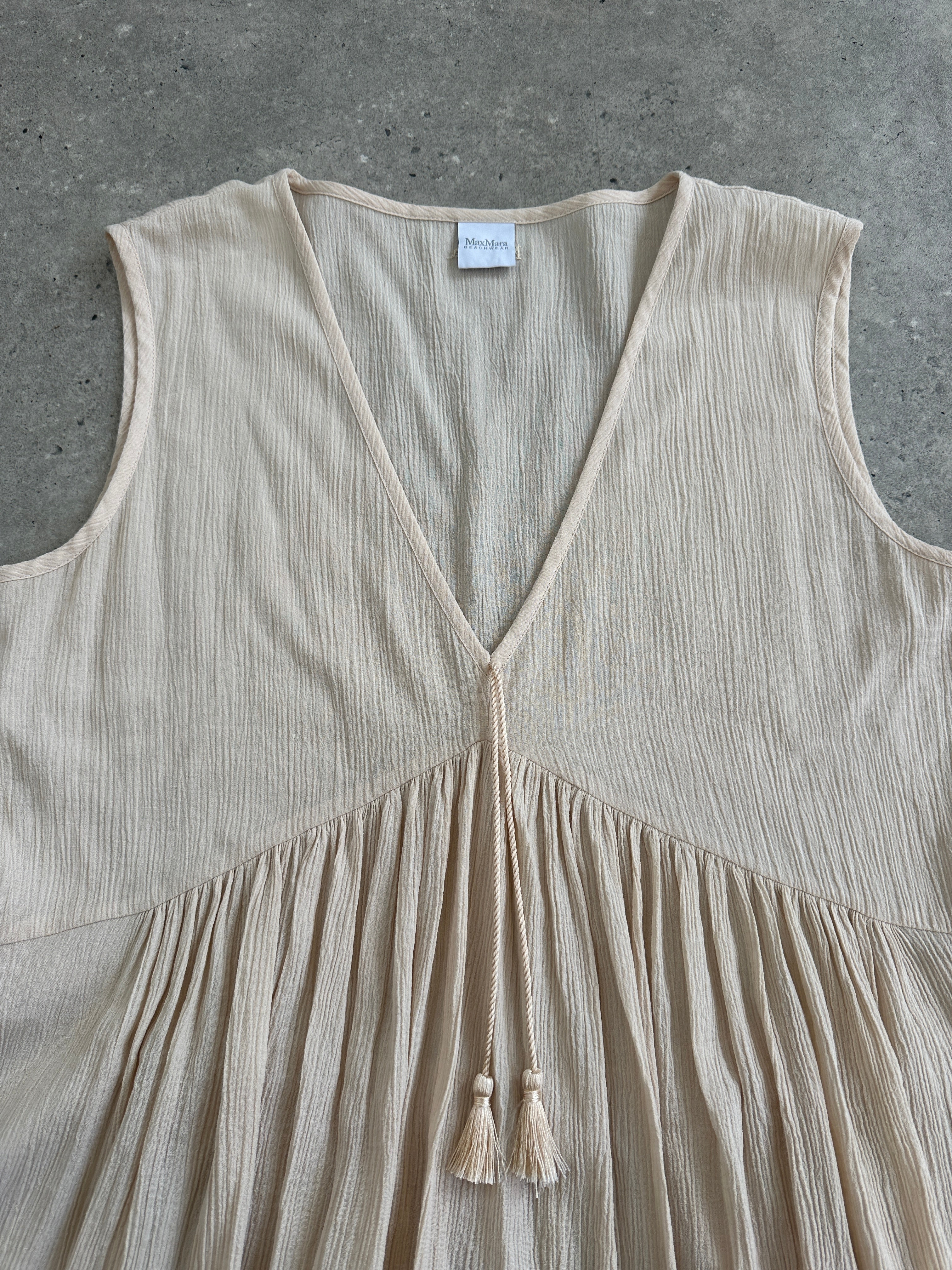 Max Mara pure cotton floor-length sun dress in UK12, showcasing a flowing sleeveless design with a fitted waist and elegant silhouette.