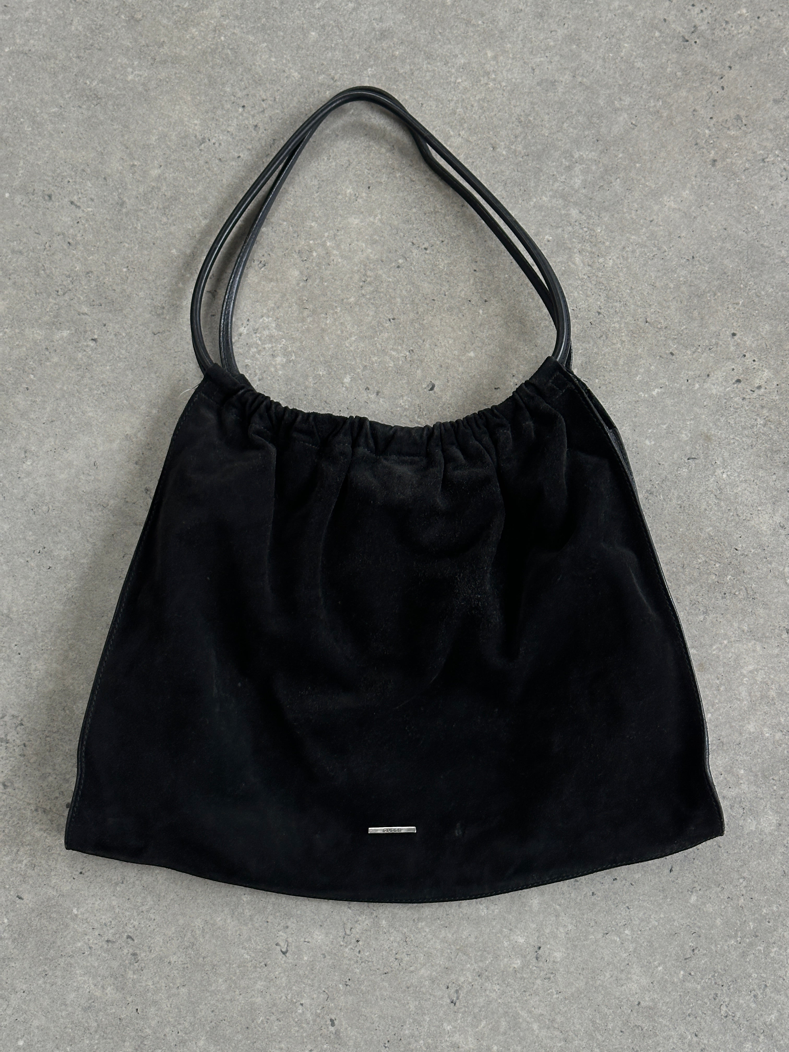 Gucci 1990s Tom Ford suede leather hobo shoulder bag with spacious design and classic brand logo detail.