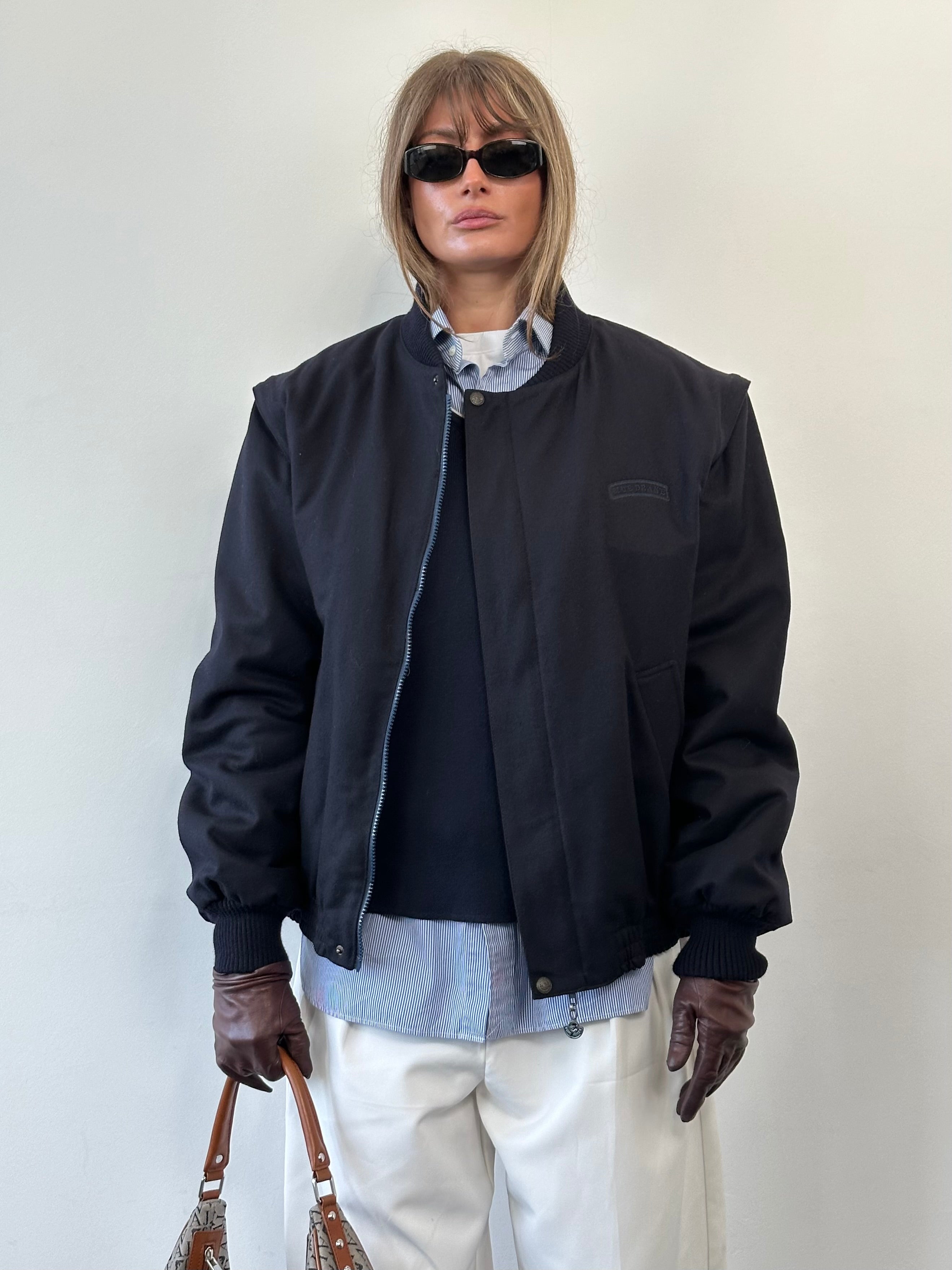 Vintage Italian vintage wool bomber jacket, size L, featuring classic design and textured fabric.
