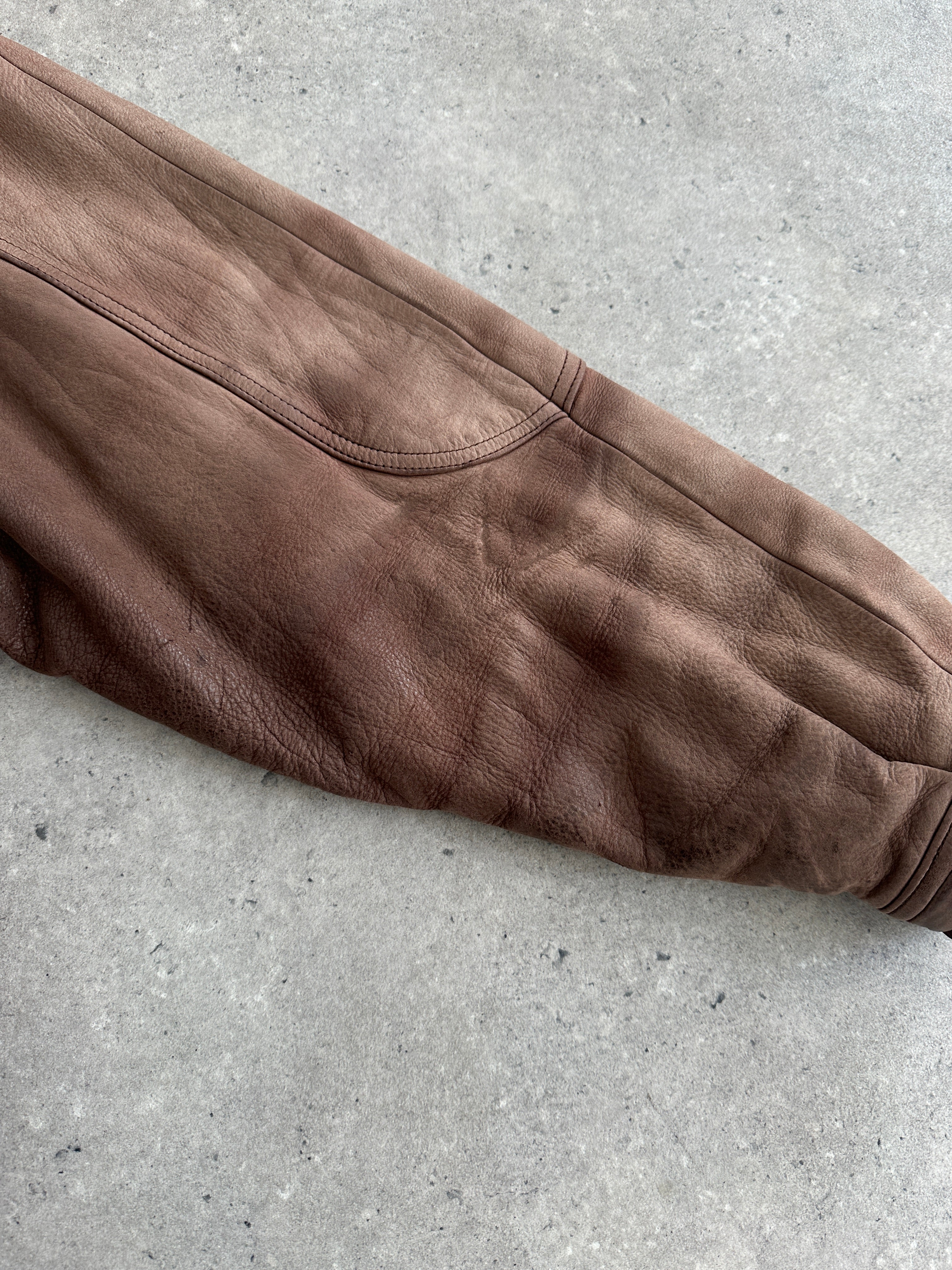Vintage 1990s high neck aged leather bomber jacket, men's size large, with distressed finish and classic style.