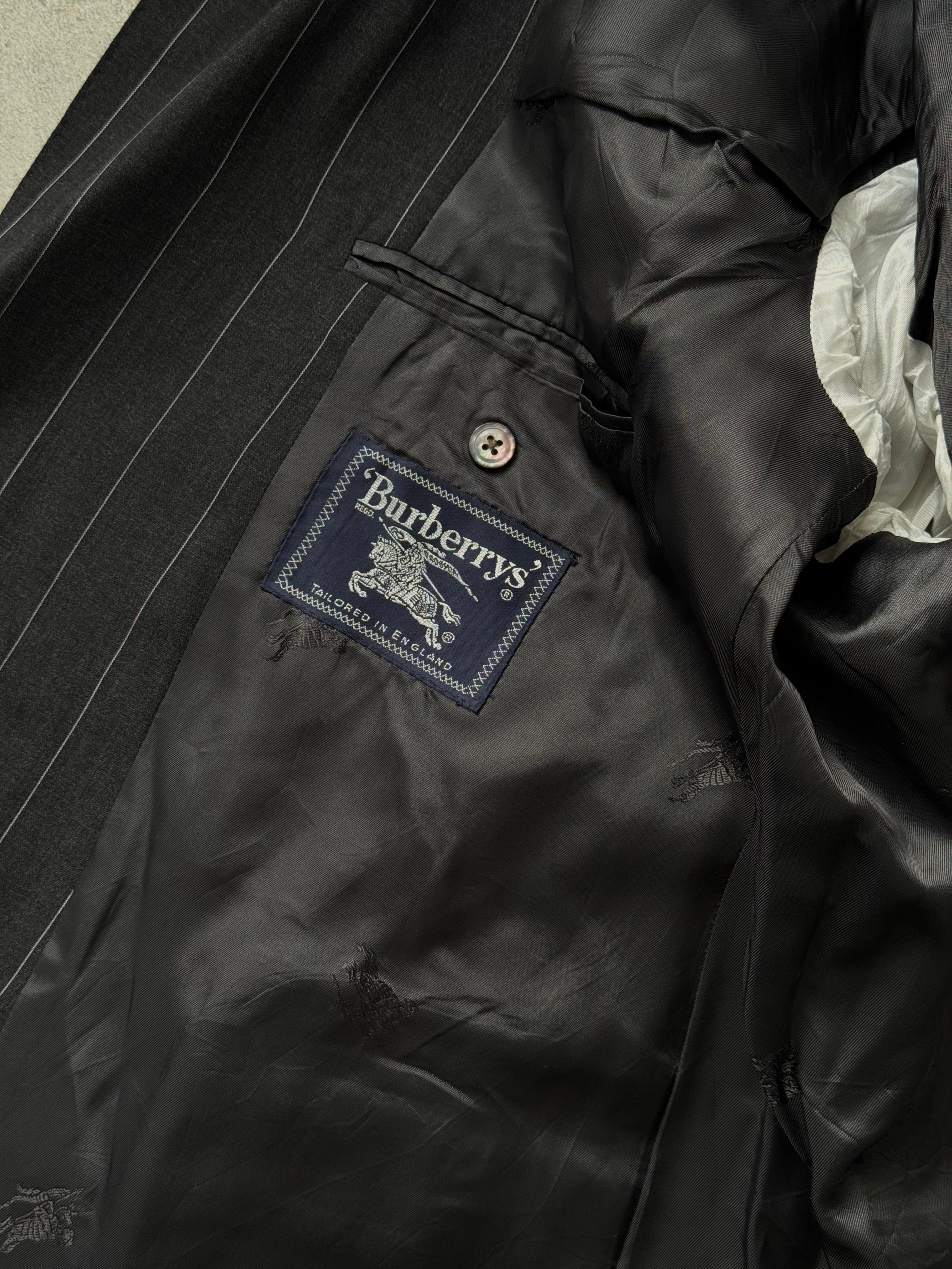 Burberry 1990s pure wool double-breasted stripe blazer in XL, showing the classic tailored fit with bold stripe pattern and structured collar.