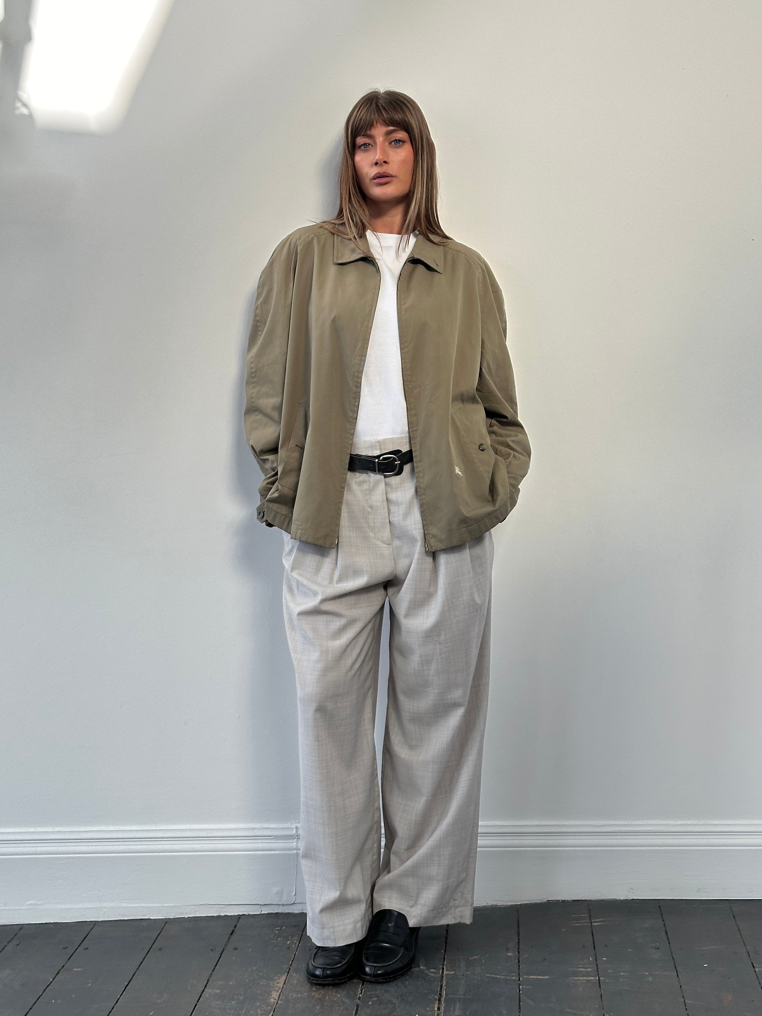 Burberry 1990s wool logo bomber jacket in size XL, featuring classic design with the iconic Burberry check pattern and logo details.