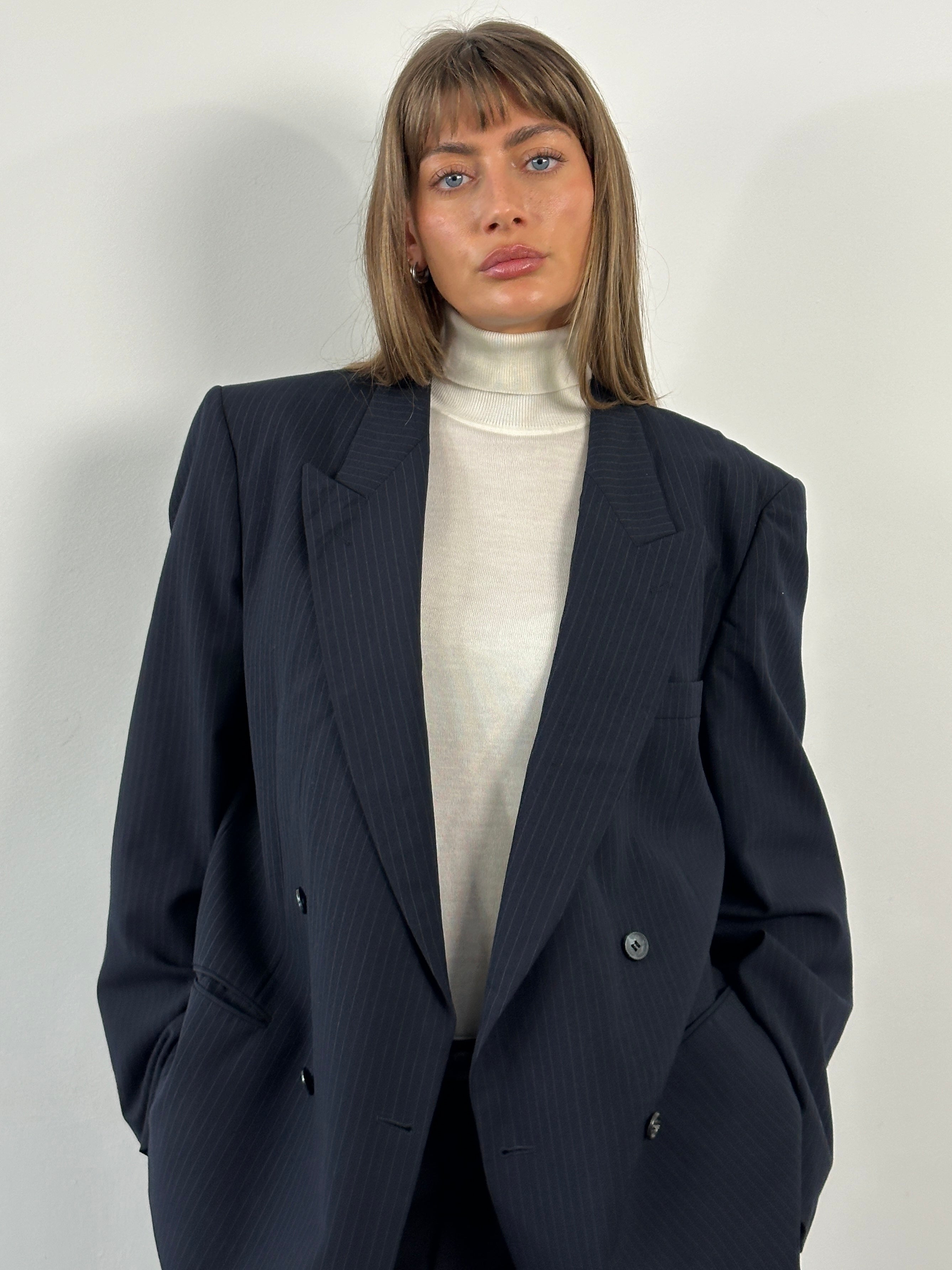 Yves Saint Laurent men's 1990s double-breasted blazer in pure wool, size 42R/XL, front view showing classic tailored fit.
