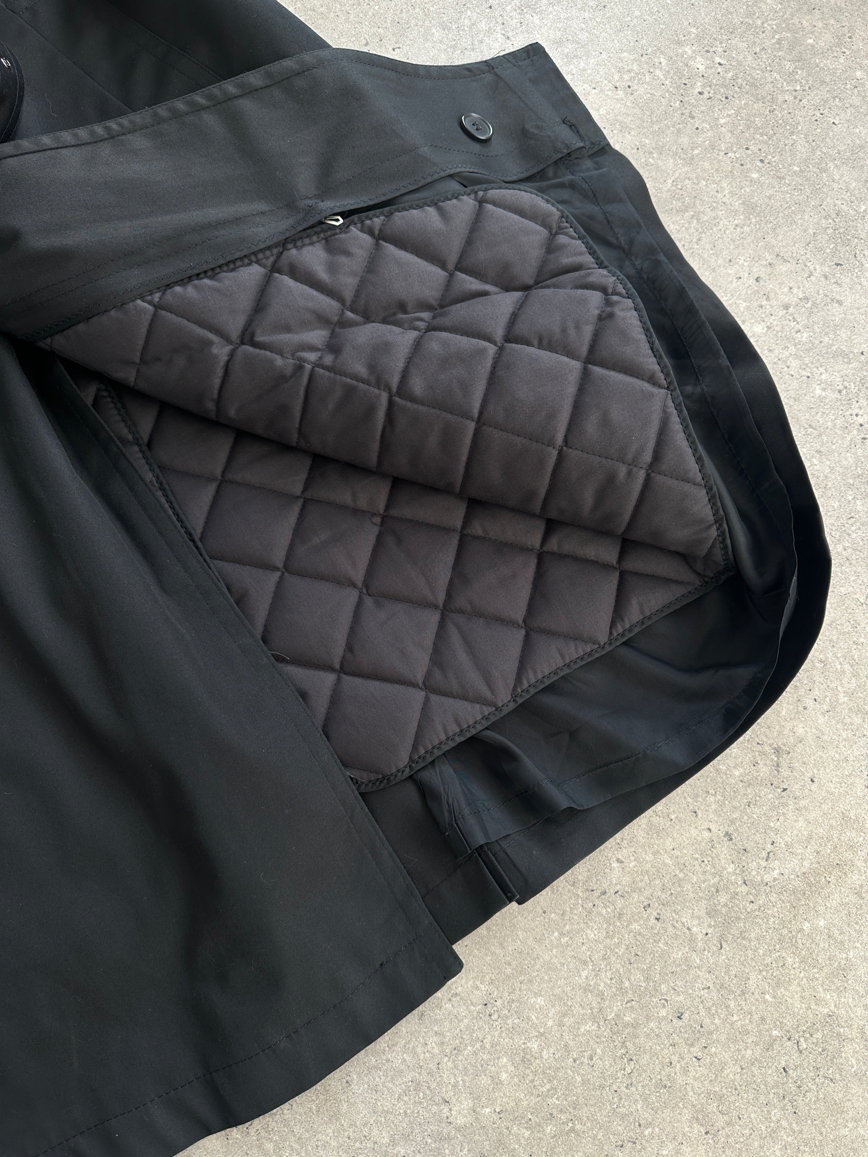 Vintage double-breasted floor-length belted trench coat in XL, showcasing classic style and details on a neutral background.