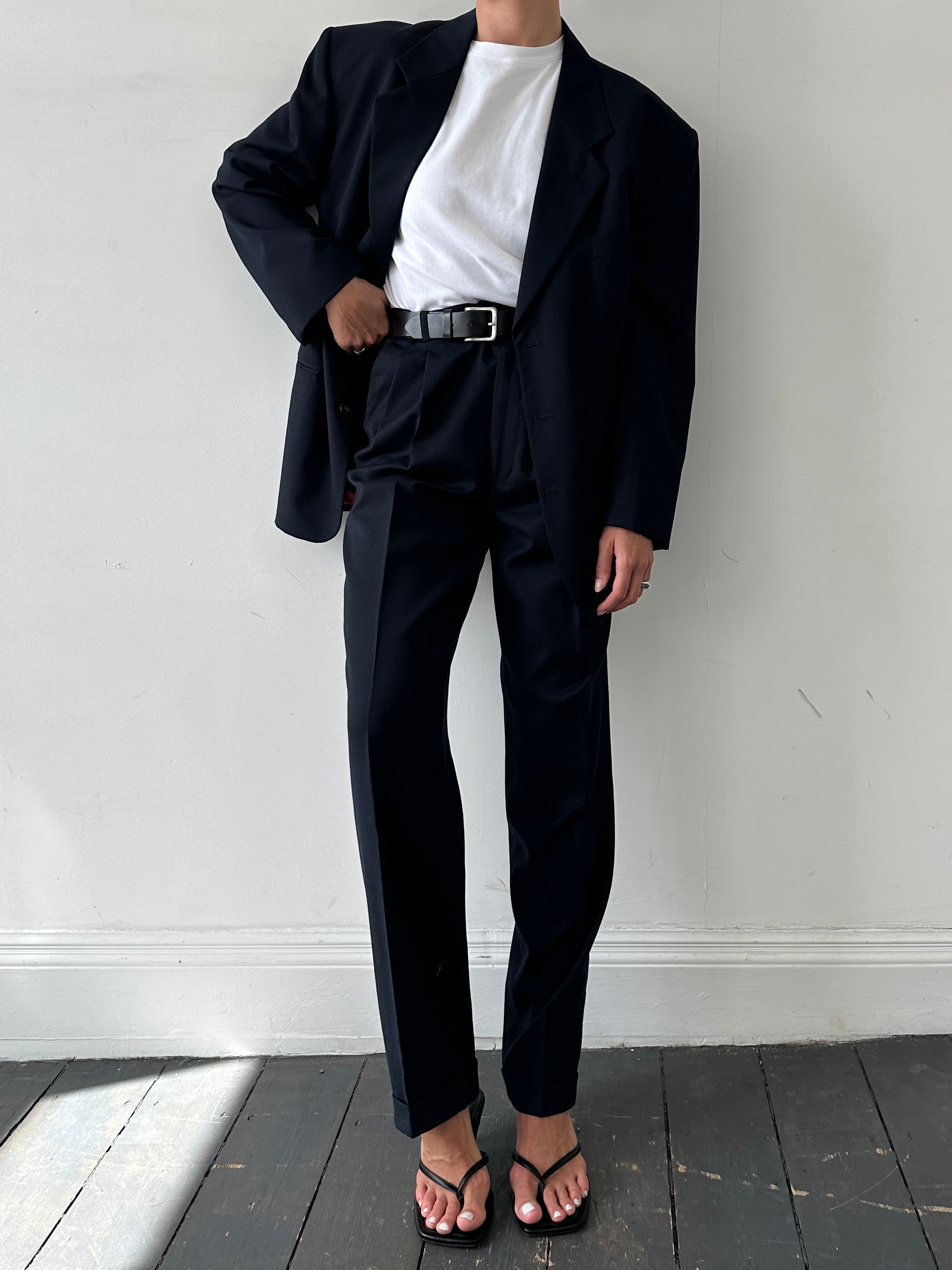 Vintage pure wool tailored trousers with straight leg fit, size W32, featuring classic design and neutral color.