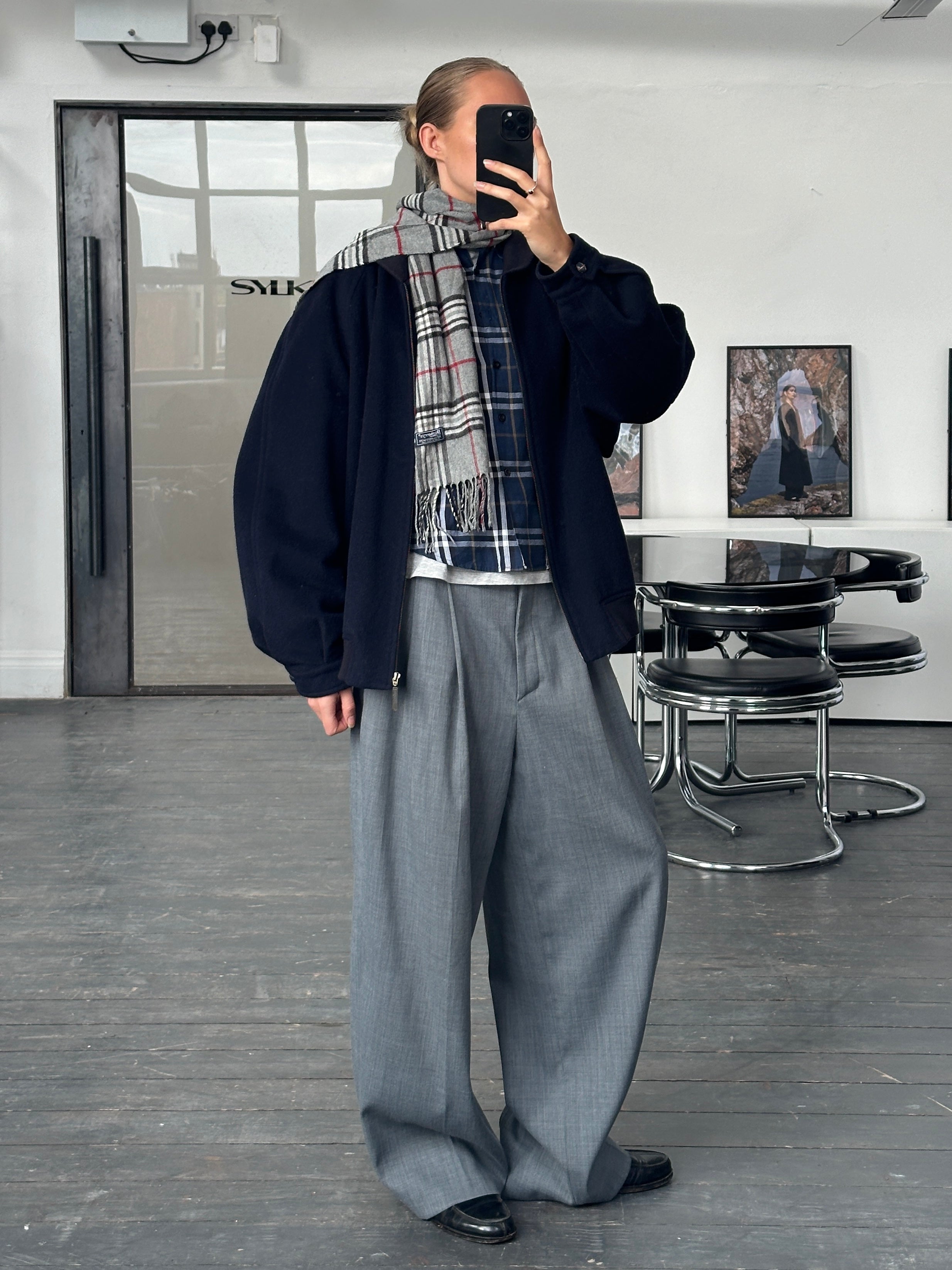 Burberry 1990s pure wool check logo bomber jacket in size L/XL, featuring classic check pattern and ribbed cuffs.