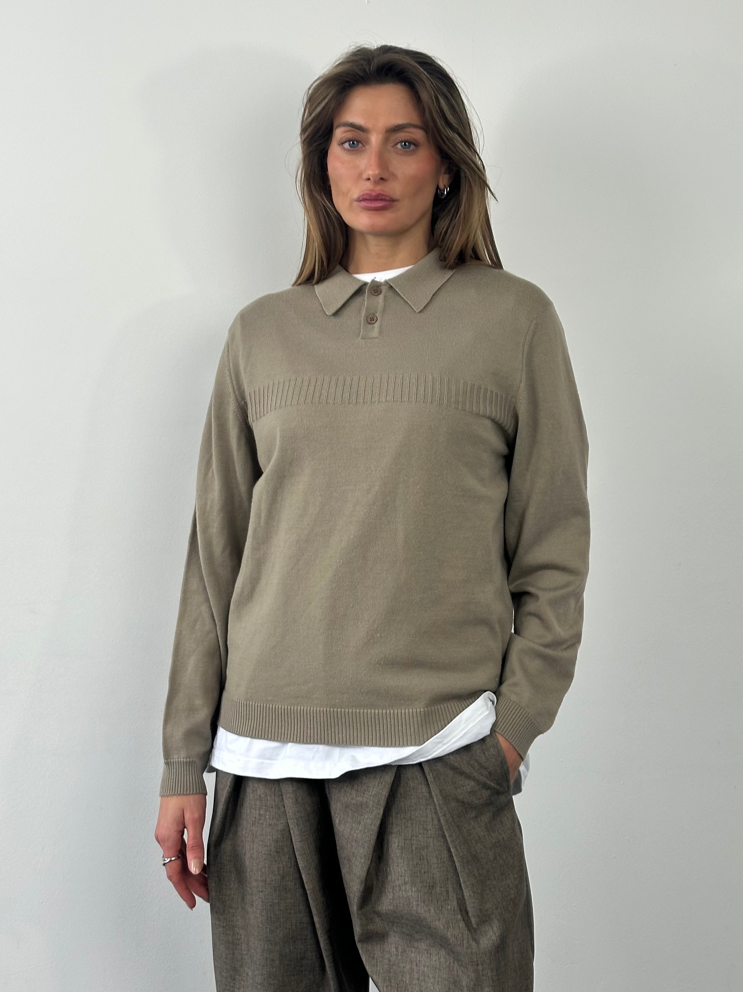 Yves Saint Laurent 1990s wool knit logo jumper in size M, featuring classic YSL branding and a cozy, textured knit fabric.