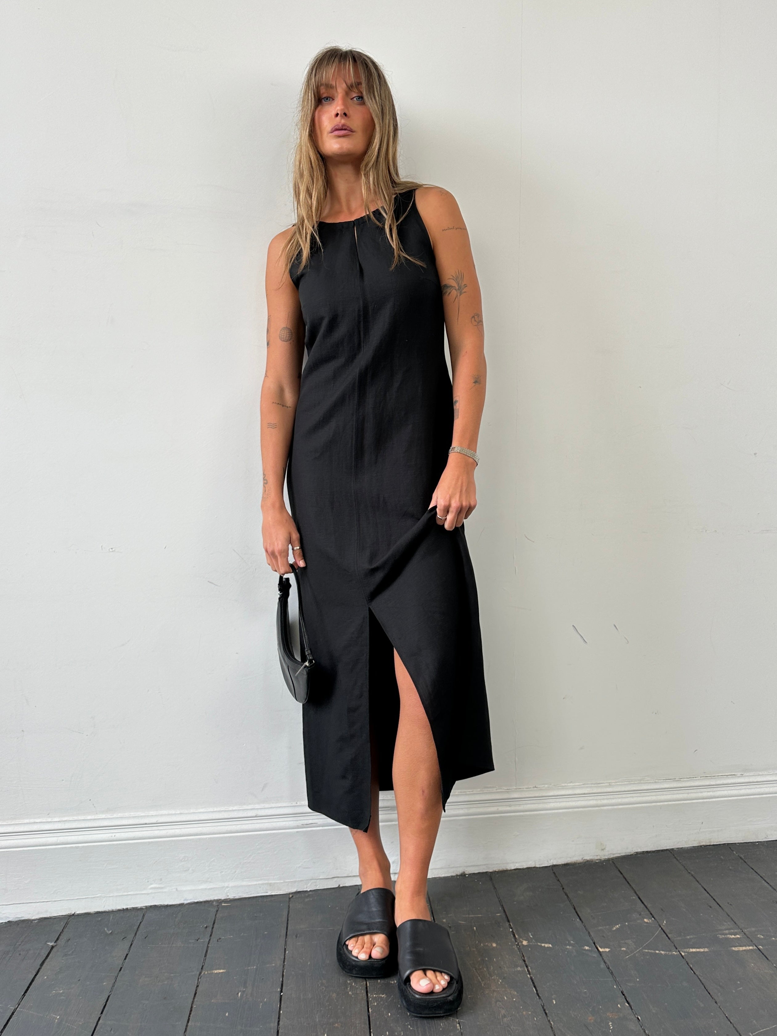 Marella linen floor-length dress in size M, featuring a flowing silhouette and elegant design, suitable for casual or formal occasions.